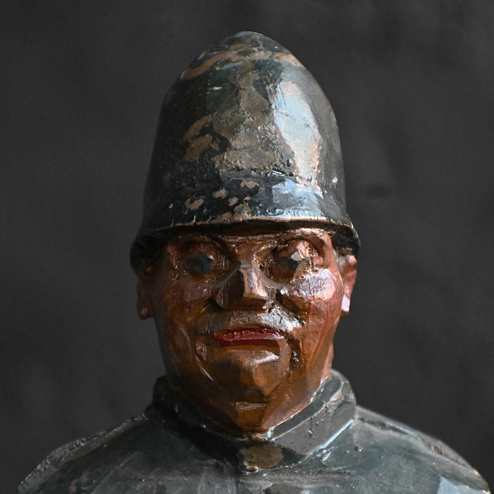 Early 20th Century English Folk-art Policeman Whirligig Figure

An early 20th Century hand carved English folk-art policeman whirligig figure. With natural wear and patina this figure would have once sat on a larger weathervane of sorts. The figure