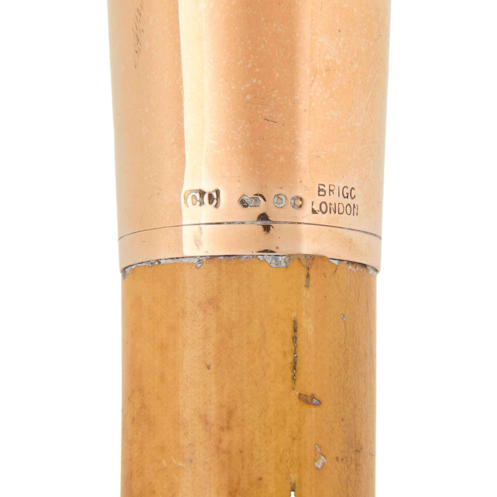 Carved Early 20th Century English Gold Mounted Cane by Thomas Brigg & Sons For Sale