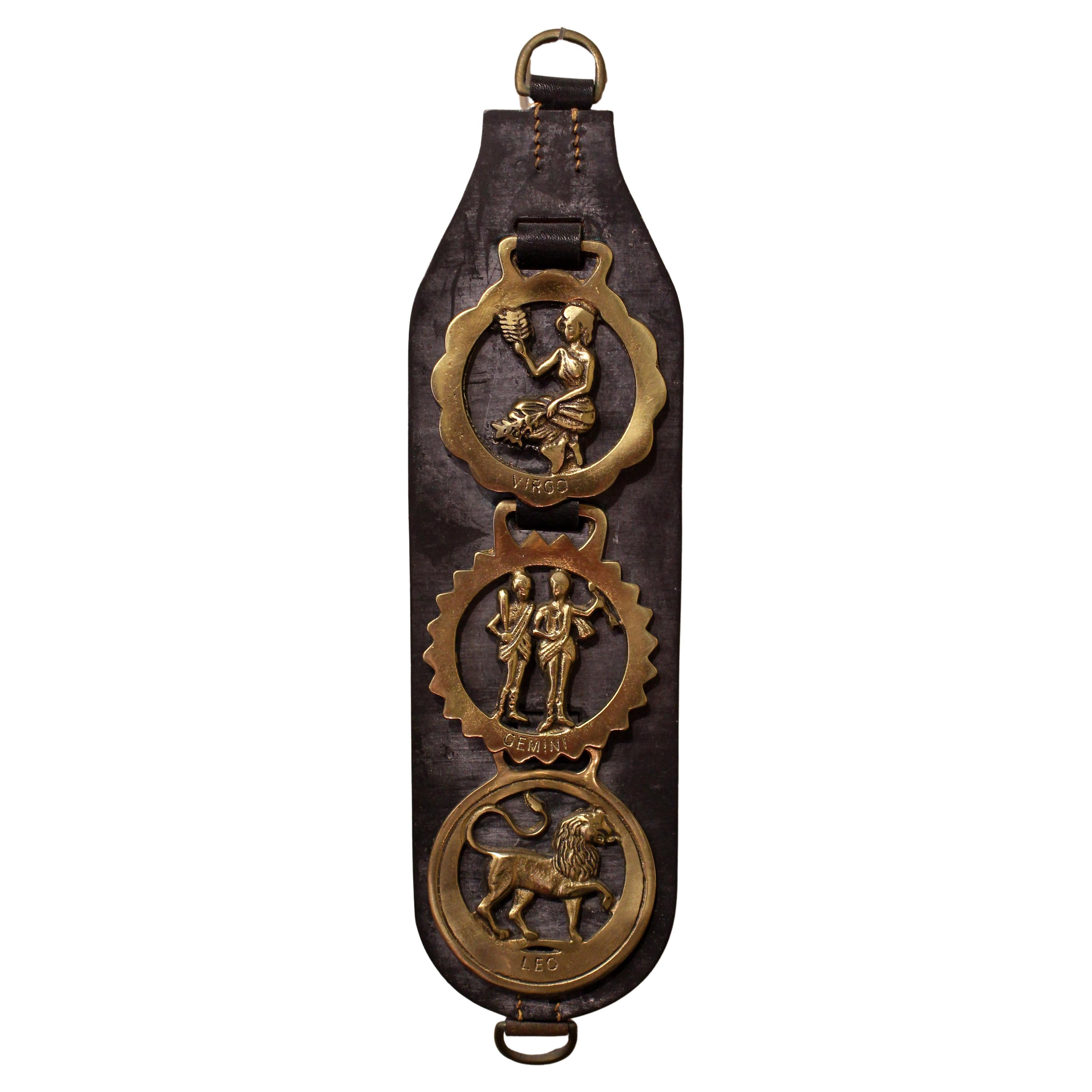 Early 20th Century English Leather Horse Strap with 3 Horse Brasses