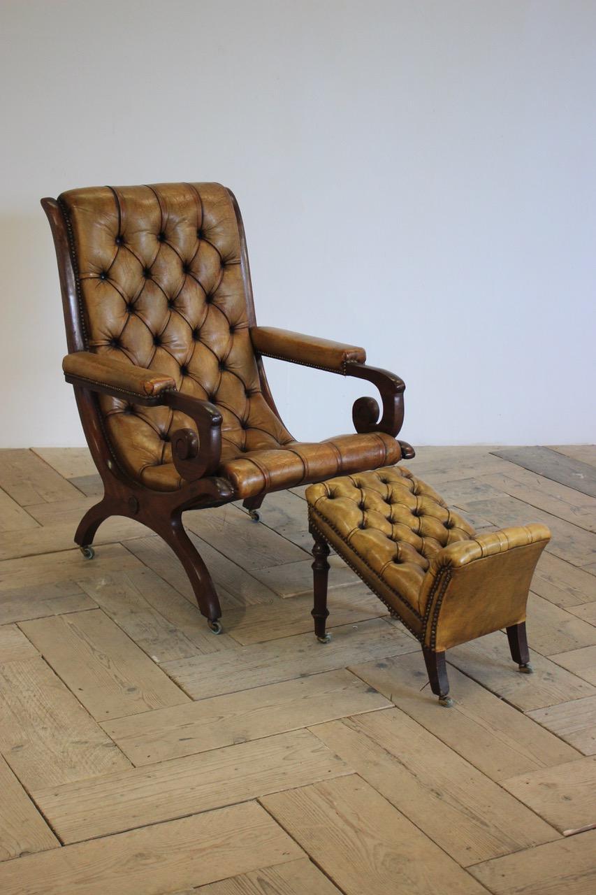 Leather Early 20th Century English Library Armchair and Foot Stool For Sale