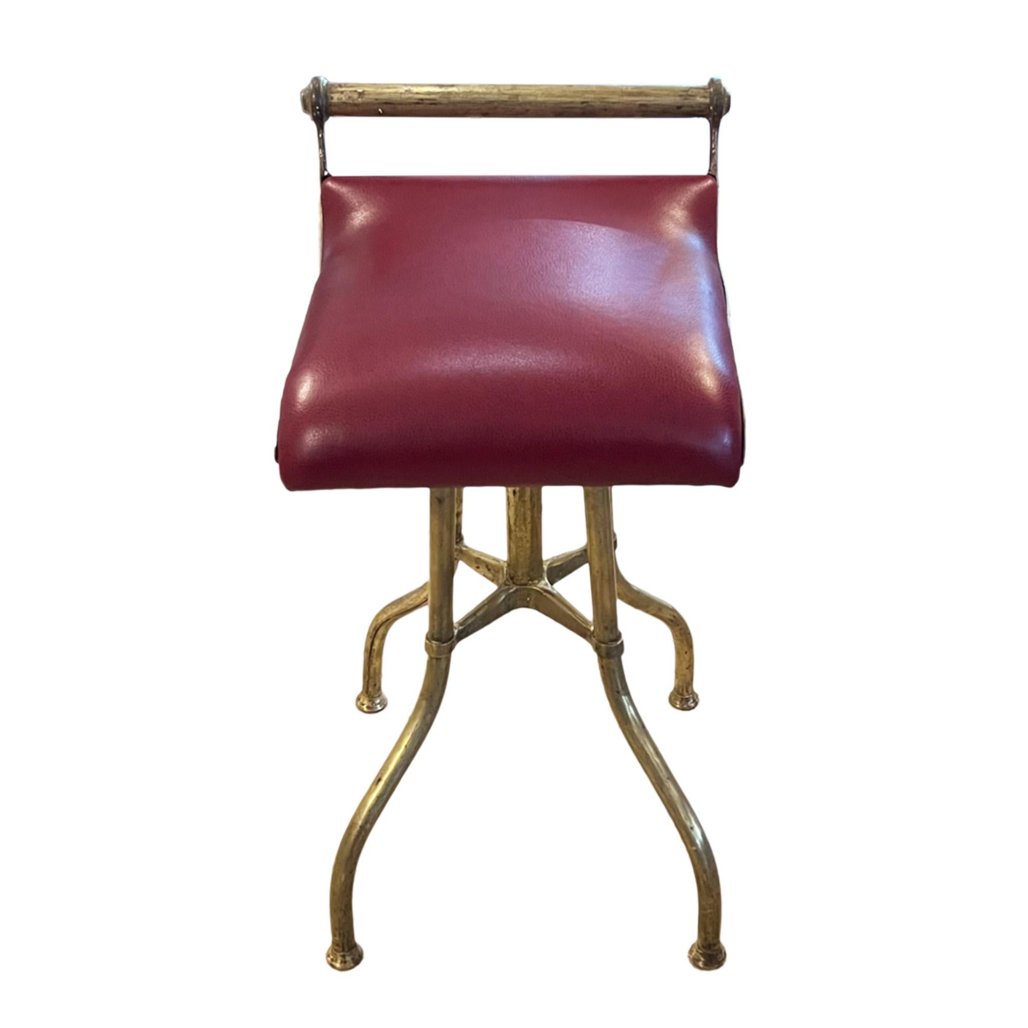 This is a lovely English music stool, which we’ve had reupholstered using a rich red leather. Fully adjustable by rotating the seat. As we’ve discovered, this is an excellent desk or dressing table stool too!

Made and patented by the company C. H.
