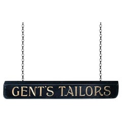 Early 20th century English reverse painted tailor’s sign
