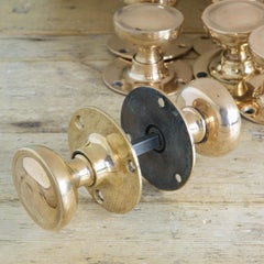 Early 20th Century English Rose Brass Door Knobs