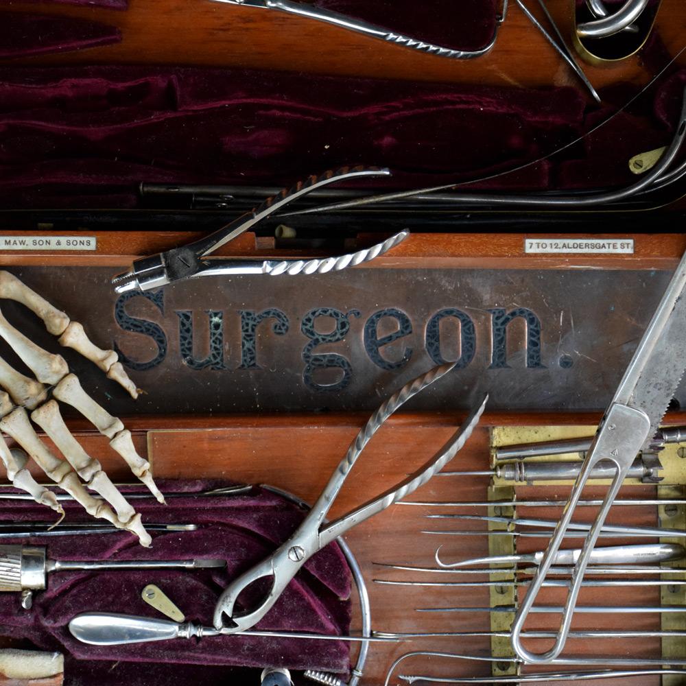 Early 20th Century English S. Maw. Son & Sons Surgeons Kit 

A rare set of S. Maw. Son & Sons Surgeons Kit, contained in a brass stamped mahogany hinged box with 2 compartments. Including many tools, most of which are stamped with a London makers
