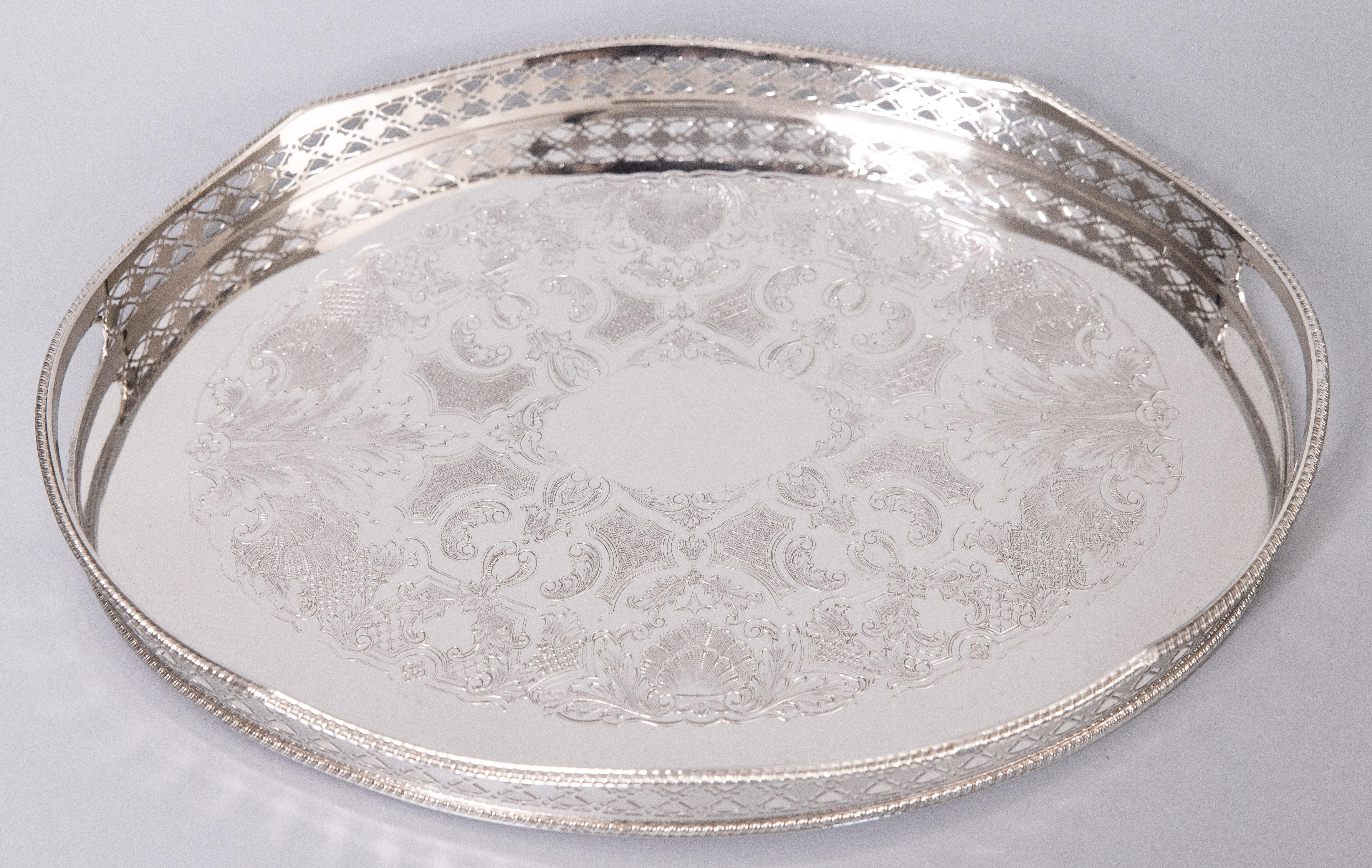 A fine antique English silverplate on copper footed gallery serving or barware drinks tray with handles. Marked 