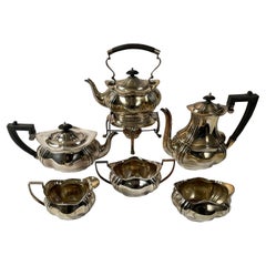 Early 20th Century English Silver Tea Set with Black Handles