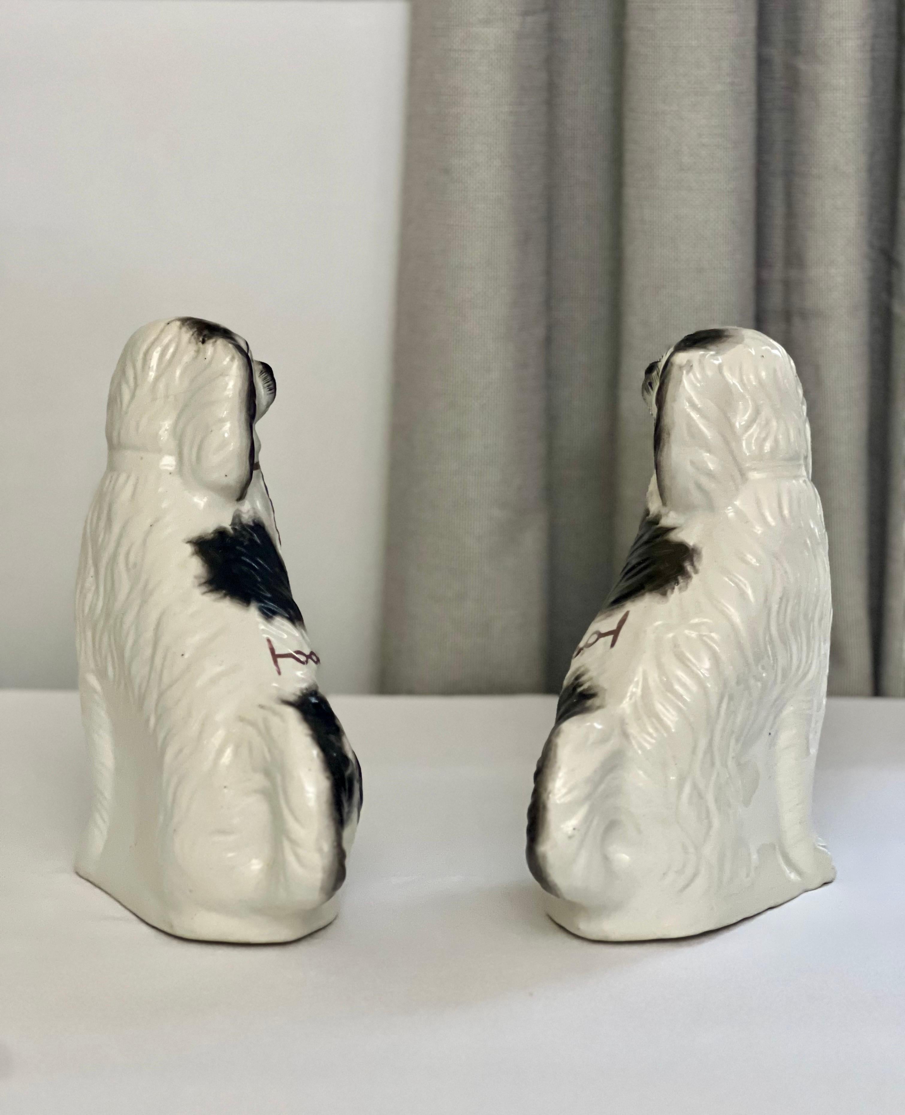 Fired Early 20th Century English Staffordshire Spaniel Dog Figurines, Pair For Sale