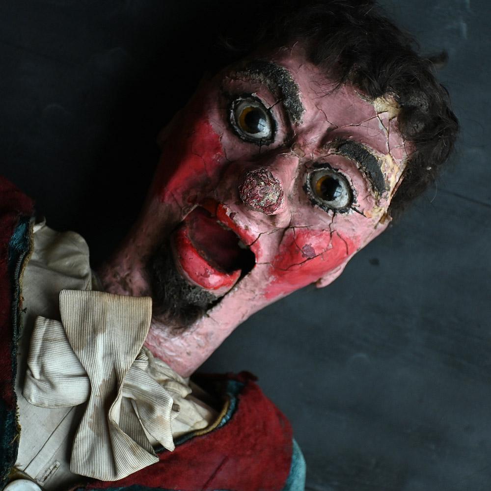 Early 20th Century English Ventriloquist Dummy 
 
An unusual example of a hand-crafted early 20th Century English ventriloquist dummy. With tailored made velour outfit with pearl buttons. Silk hand stitched gloves and cotton shirt with tie. The head