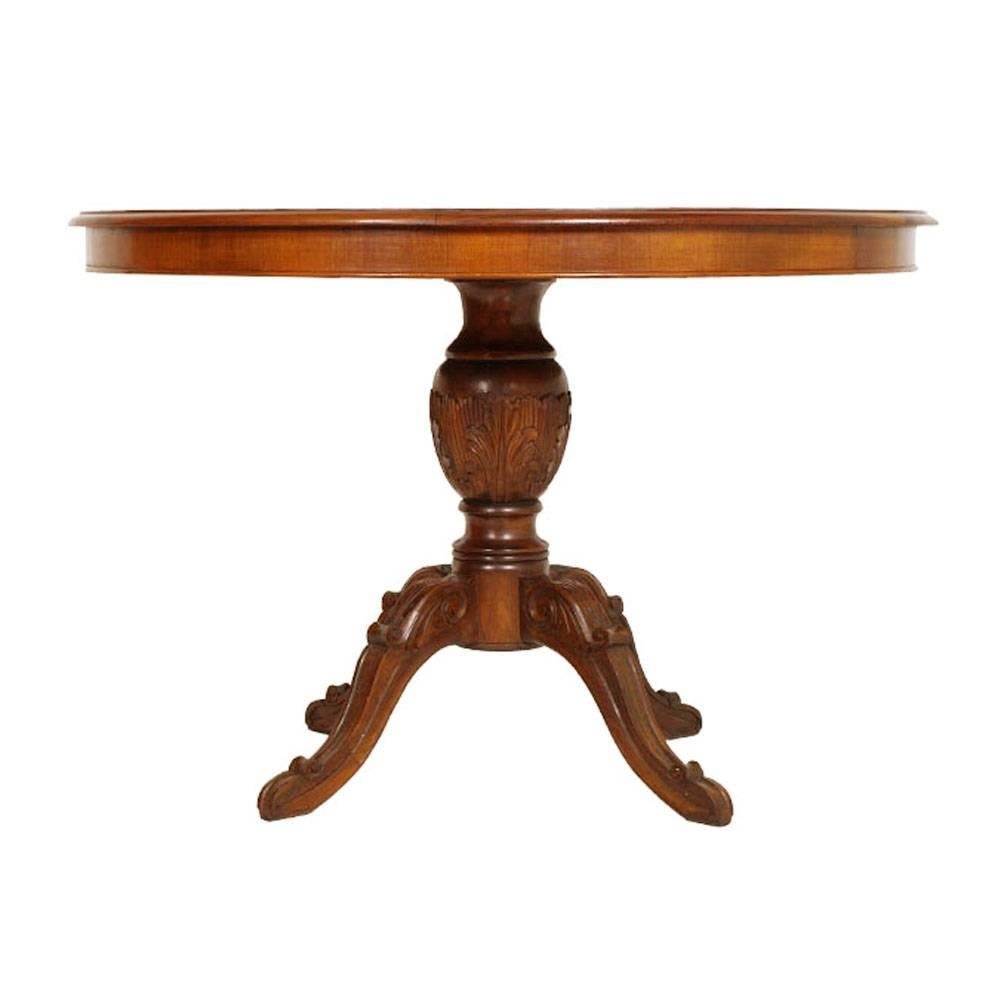 Elegant 1900 neoclassic  Art Nouveau solid hand-carved walnut round table with veneered walnut top, polished to wax. Excellent patina.
Measures cm: Height 80, diameter 120.