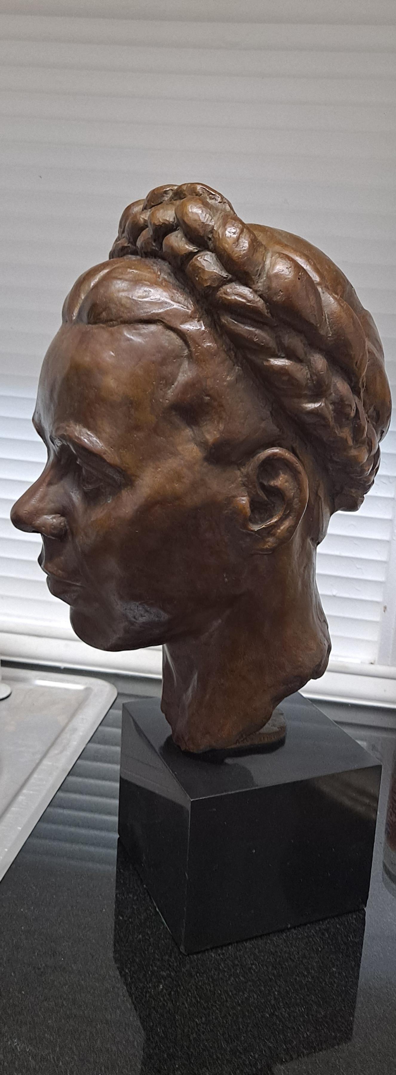 Early 20th Century Exceptional Bronze Female Bust Sculpture by Mystery Artist. 

Created in the lost waxed method

Truly a unique museum quality piece 

Foundry marks on side of bronze base

Reads: 