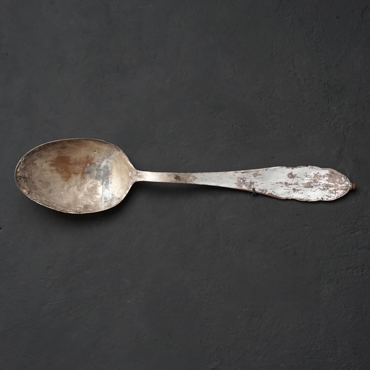 Very nice 1920s 1930s large metal industrial advertising sign in the form of a spoon in Rococo style.
The Spoon is heavy and partly silver plated.
I think the 'back' of the spoon was the visible part, maybe with text on the white painted parts.
Now