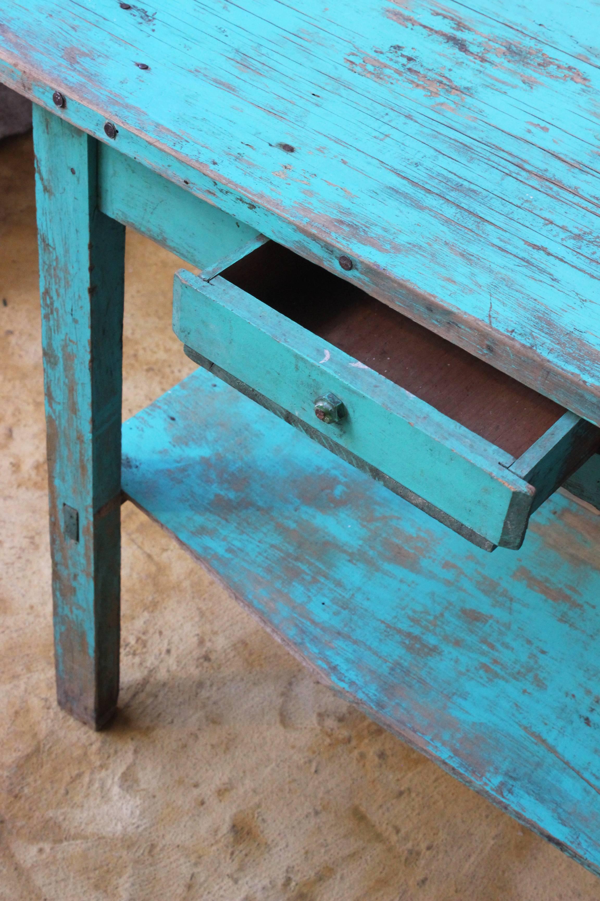 Early 20th century colorful farm table found in Western México, the table has some minor losses and color fading. Perfect for giving a colorful touch to a decoration project.