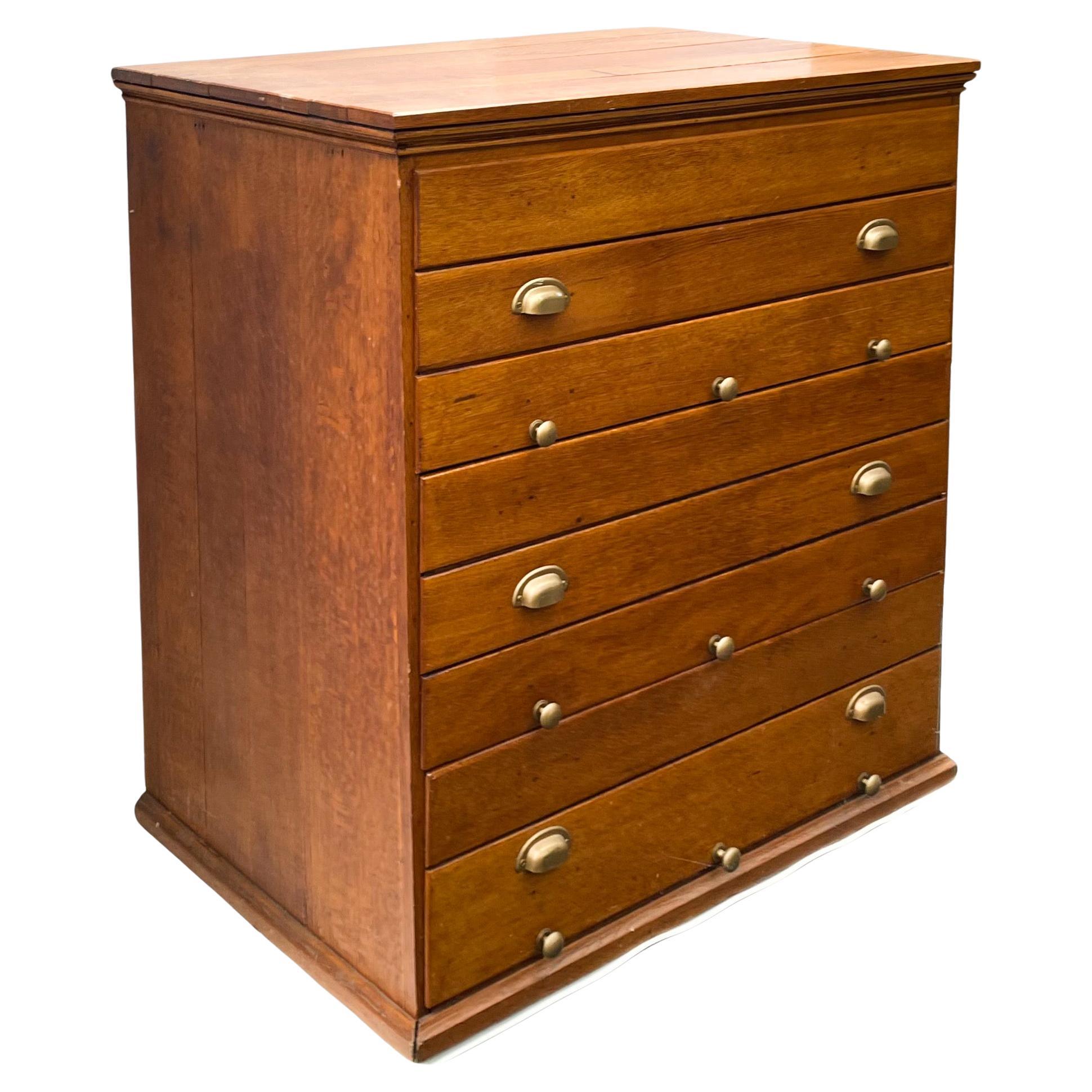 This is an early 20th century farmhouse modern style quarter sawn oak filing cabinet is in very good condition. Drawer heights 13”. The smaller knobs pull to adjust the interior file supports. Interior measurement is 11” in length with a depth of