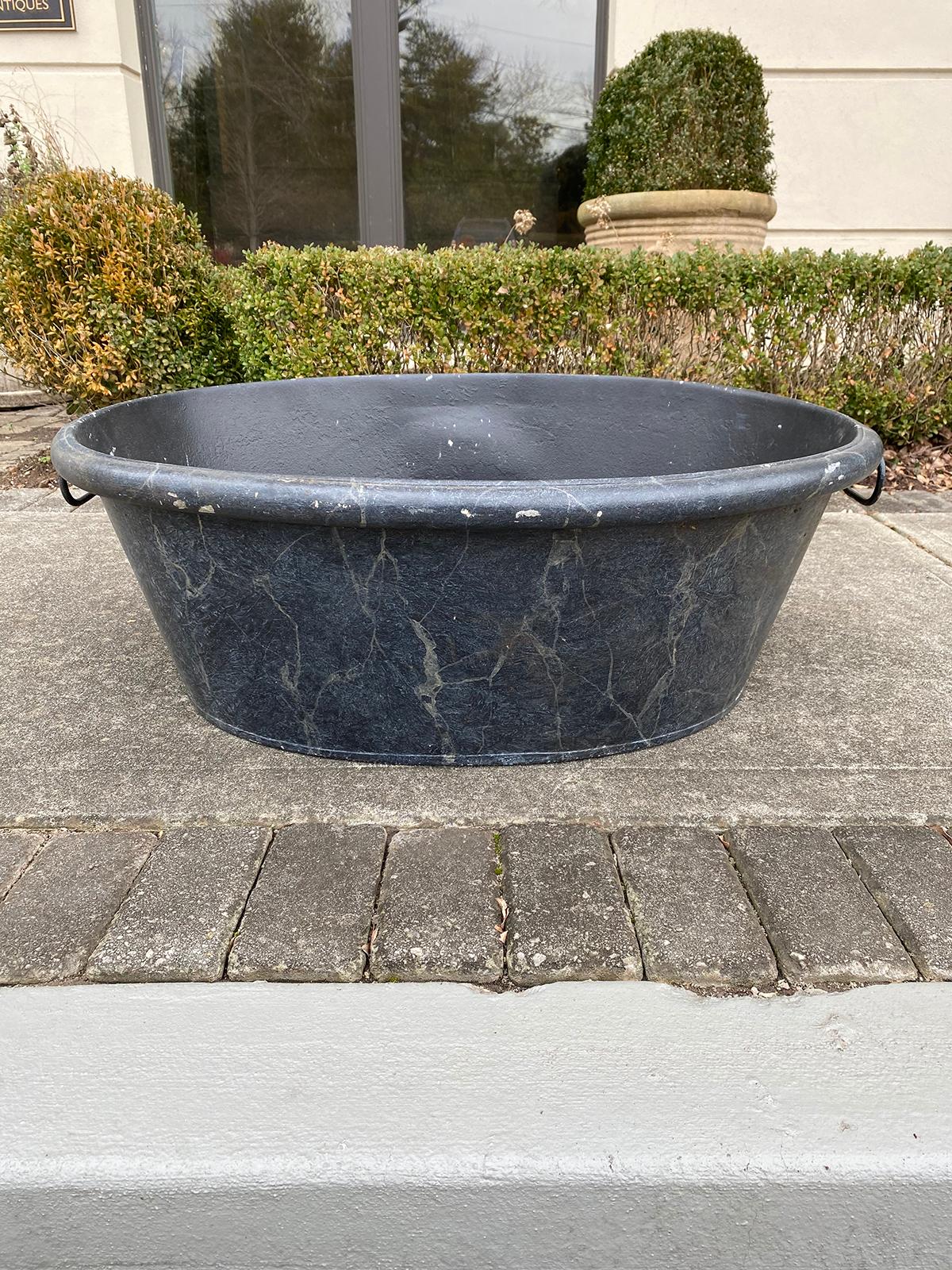 Early 20th century faux marble tole footbath, large scale.