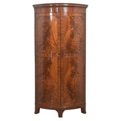 Early 20th Century Figured Mahogany Bowfront Corner Wardrobe