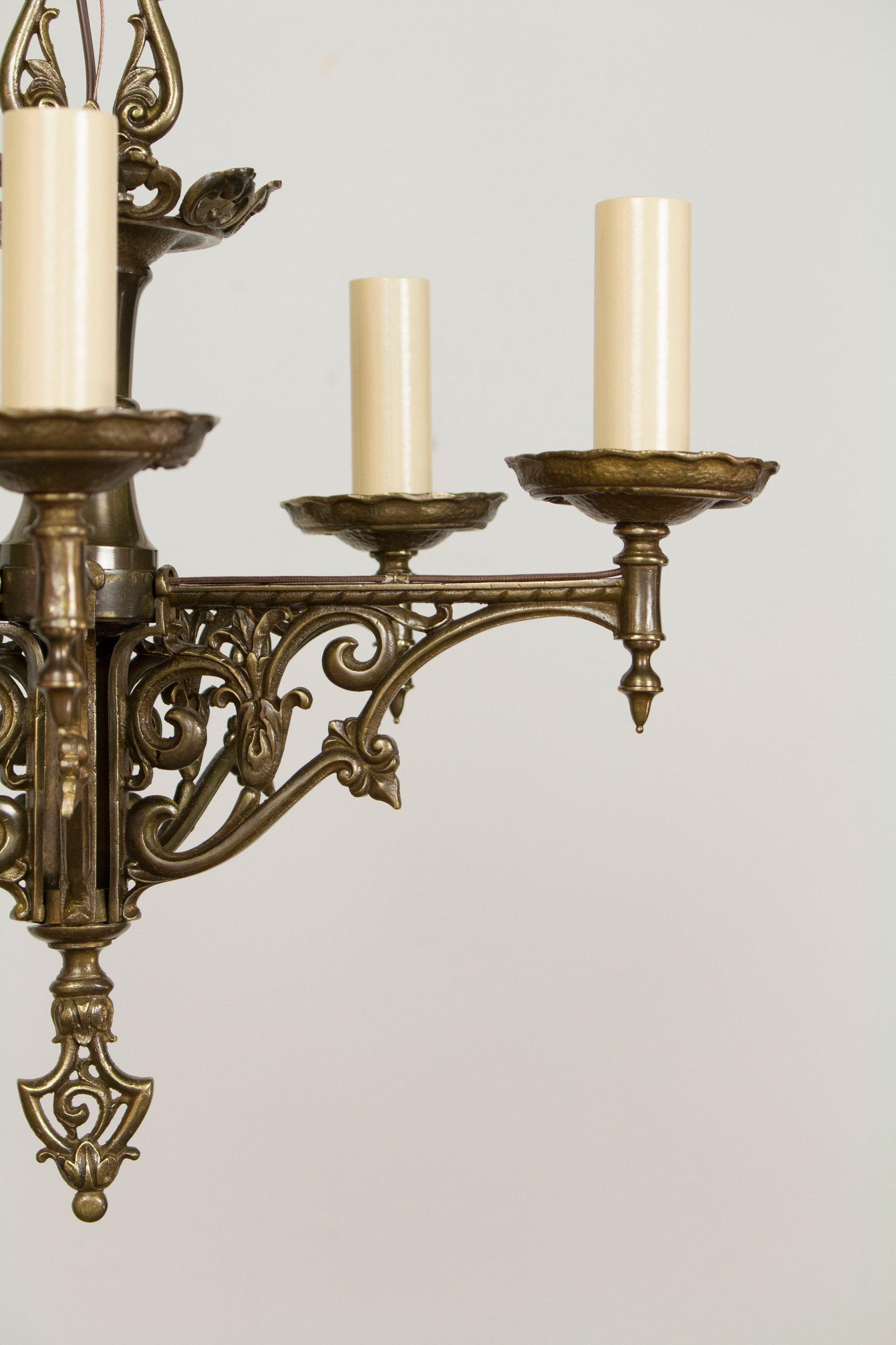 Five Light Tudor Chandelier. Solid Brass with a dark patina finish. Completely Restored and Rewired,  ready to hang. Revival Style, American, C. 1930

Matching Three Arm Tudor Chandelier  is available as well, C349.  

Dimensions: Diameter: 19
