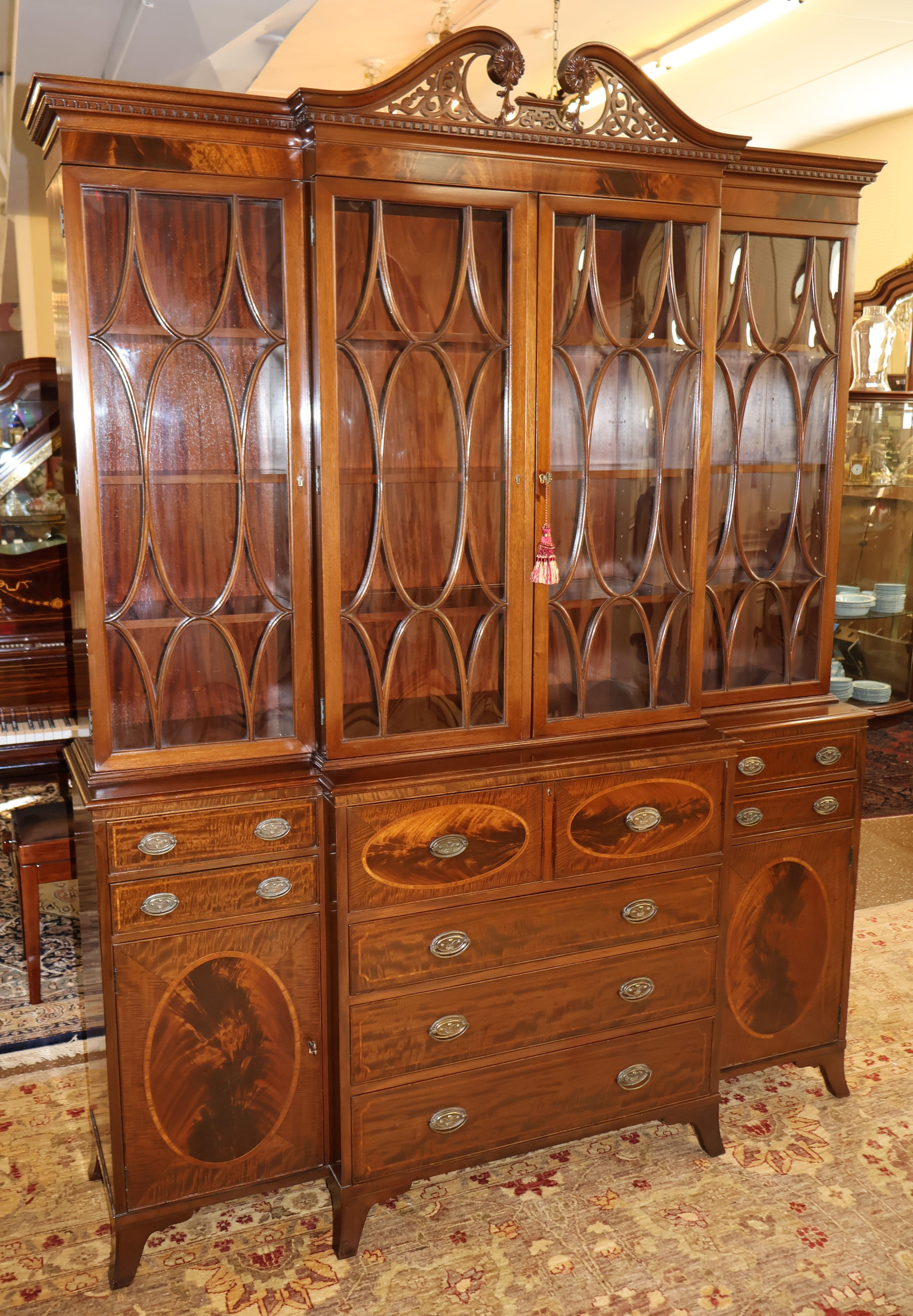 Early 20th Century Flame Mahogany Cabinet Bookcase Breakfront By Warsaw In Good Condition For Sale In Long Branch, NJ