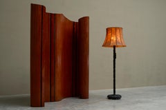 Early 20th Century Floor Lamp in Hand Carved Wood with Stunning Leather Shade