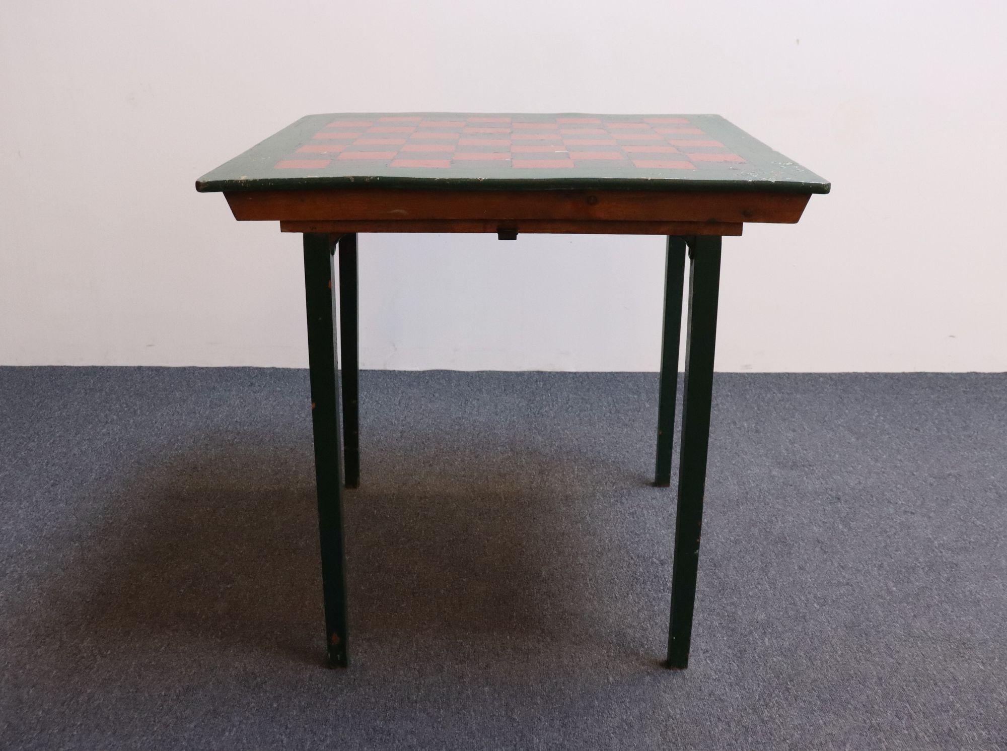 H.C. Dallmeyer wooden square table hand-painted and converted to a game/chess/checkers table (ca. 1910, USA).
Ingenious design with foldable legs that allow the piece to fully collapse when not in use.
Original condition with sufficient paint