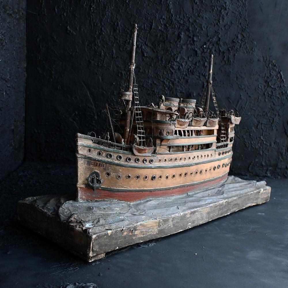 Early 20th Century Folk Art Scratch Built Ship
Without doubt, one of the nicest examples of an early 20th Century English folk art ship model named Victoria. Amazing detail and charm as shown in the photos provided. Sat on a paper and gesso base