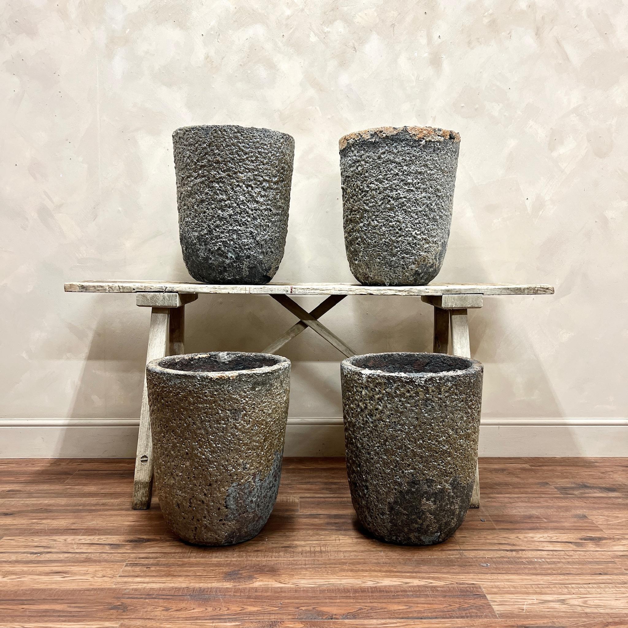 Large scale Foundry Pots, also known as Crucibles, these are usually found in the slimmer, smaller version.
Used for casting, these would have been filled with smelting metal. The combination of the heat and different metals, deposit amazing colours