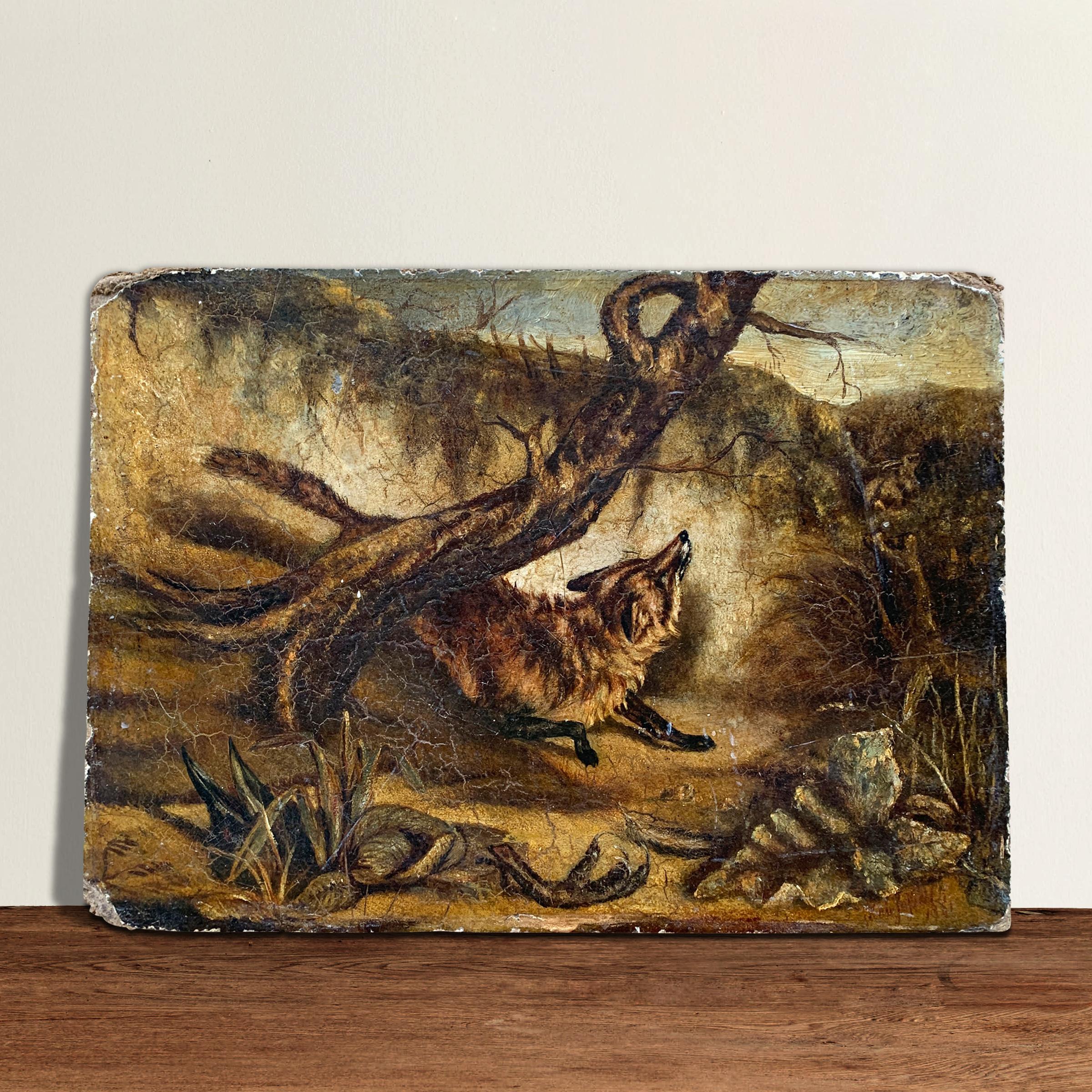 An alluring early 20th century oil on board painting depicting a fox in a hollow, with a dead crow in the foreground. Signed in pencil illegibly on the reverse.