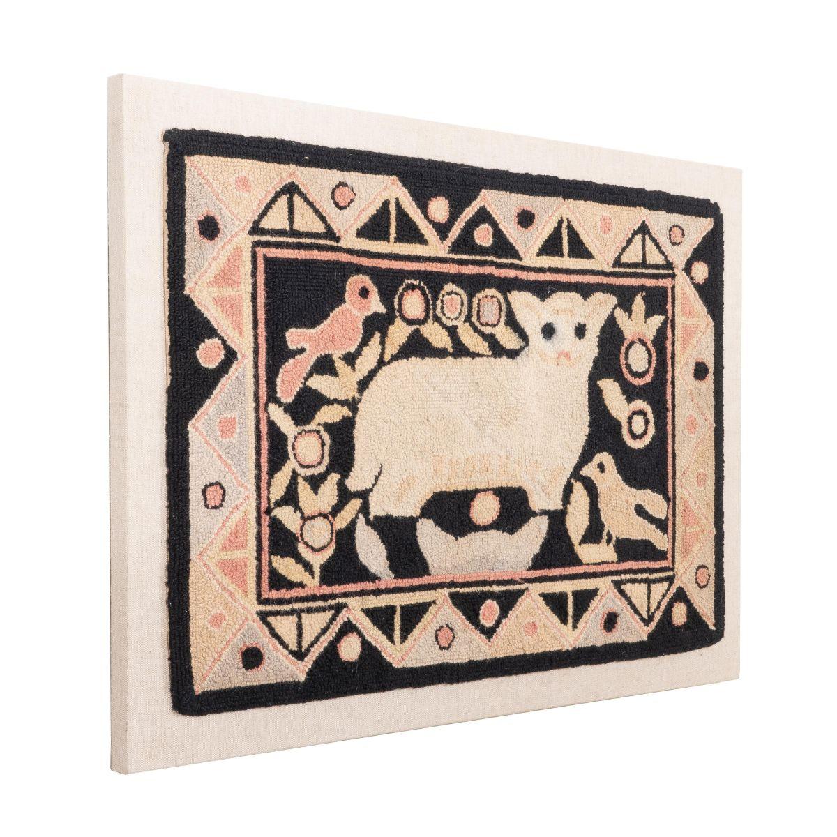 A rug of hooked wool on burlap. The design centers on a cream colored lamb on a black field populated by stylized birds and flowers within an Art Deco geometric border. Black, gray, and tan with accents of dusky peach. Mounted on linen.
American,