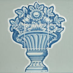 Placa de azulejos de Delft de principios del siglo XX enmarcada en azul y blanco