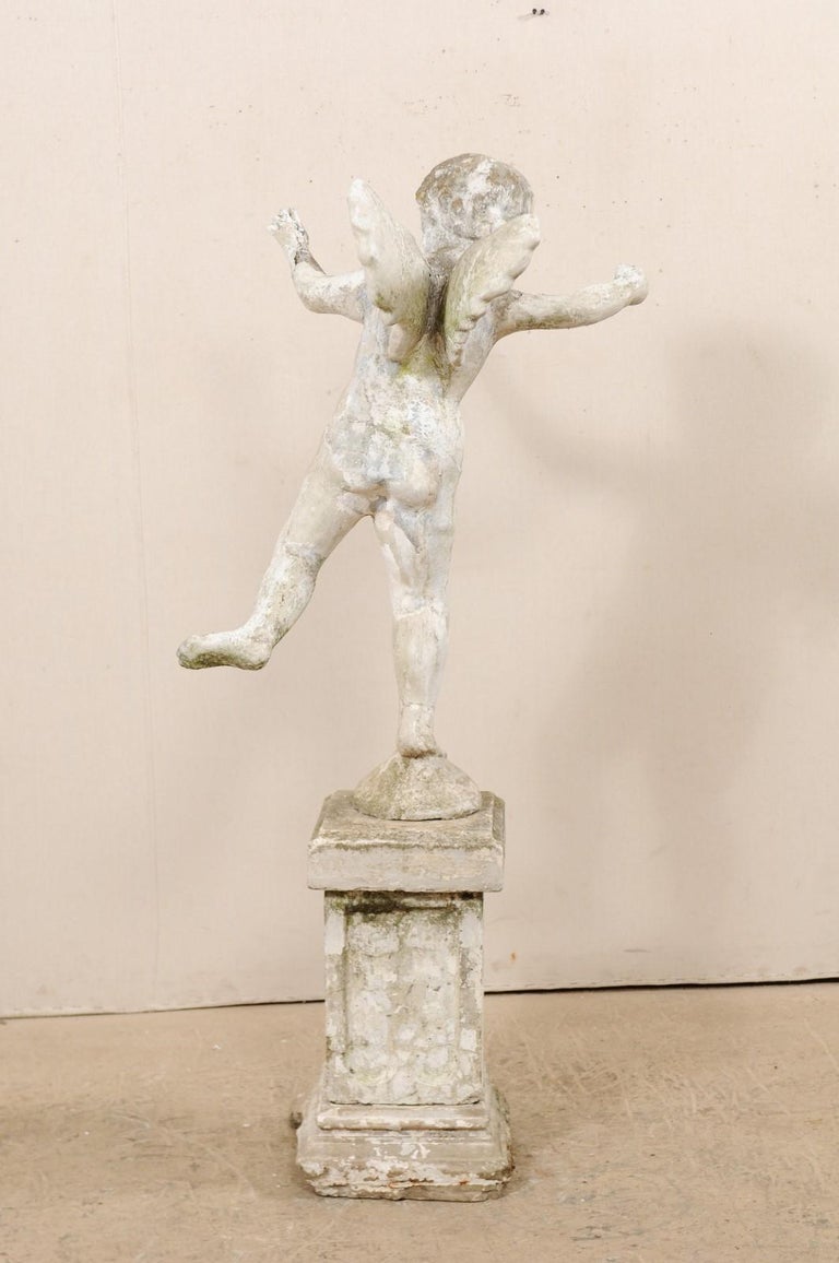 Early 20th Century French Antique Cupid Garden Statue For Sale at 1stDibs
