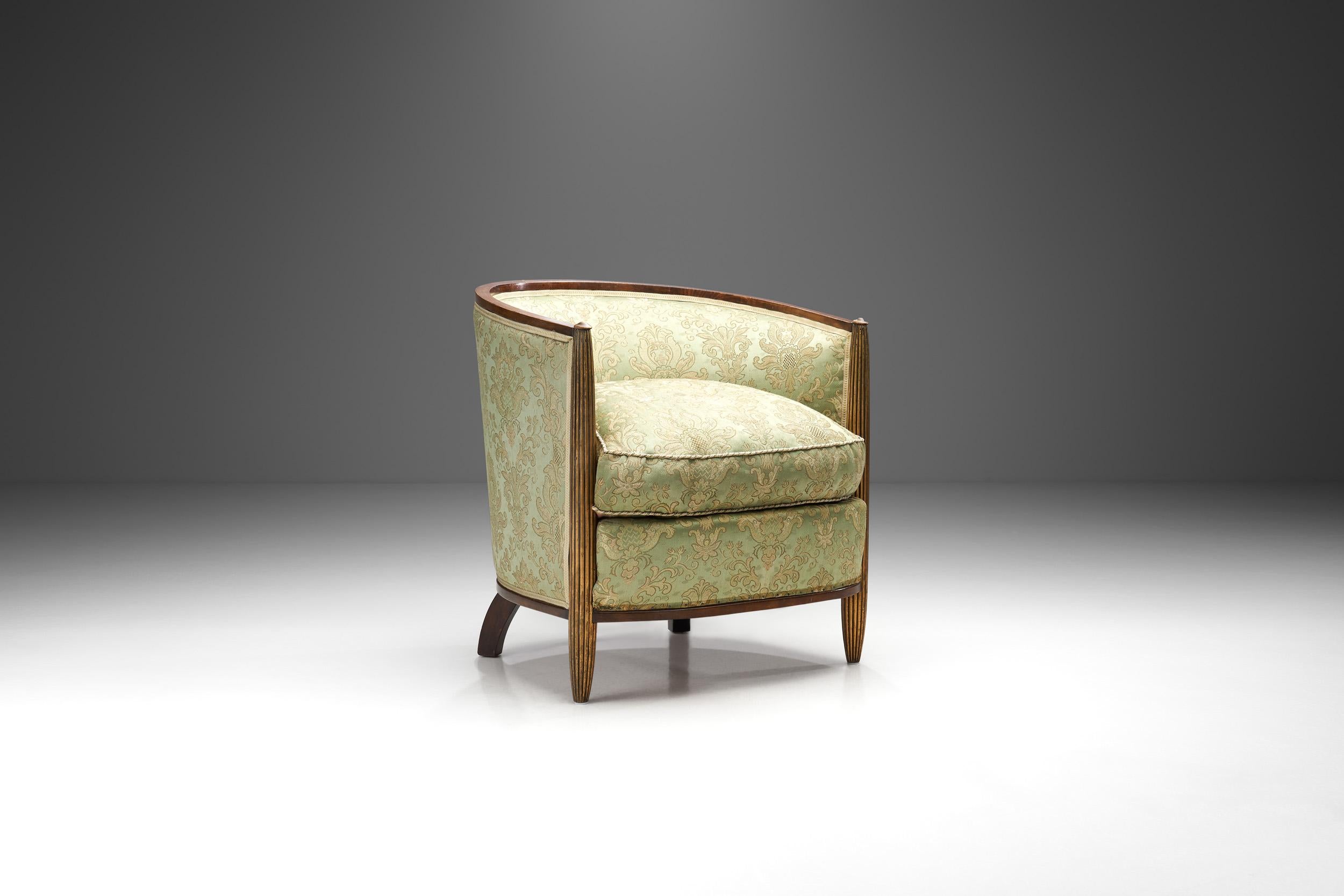 This armchair recalls a beautiful era in French design history. The early 20th century saw the rise of Art Nouveau in much of Europe, first and foremost, in France. French furniture makers embraced this style, and in the years between the World