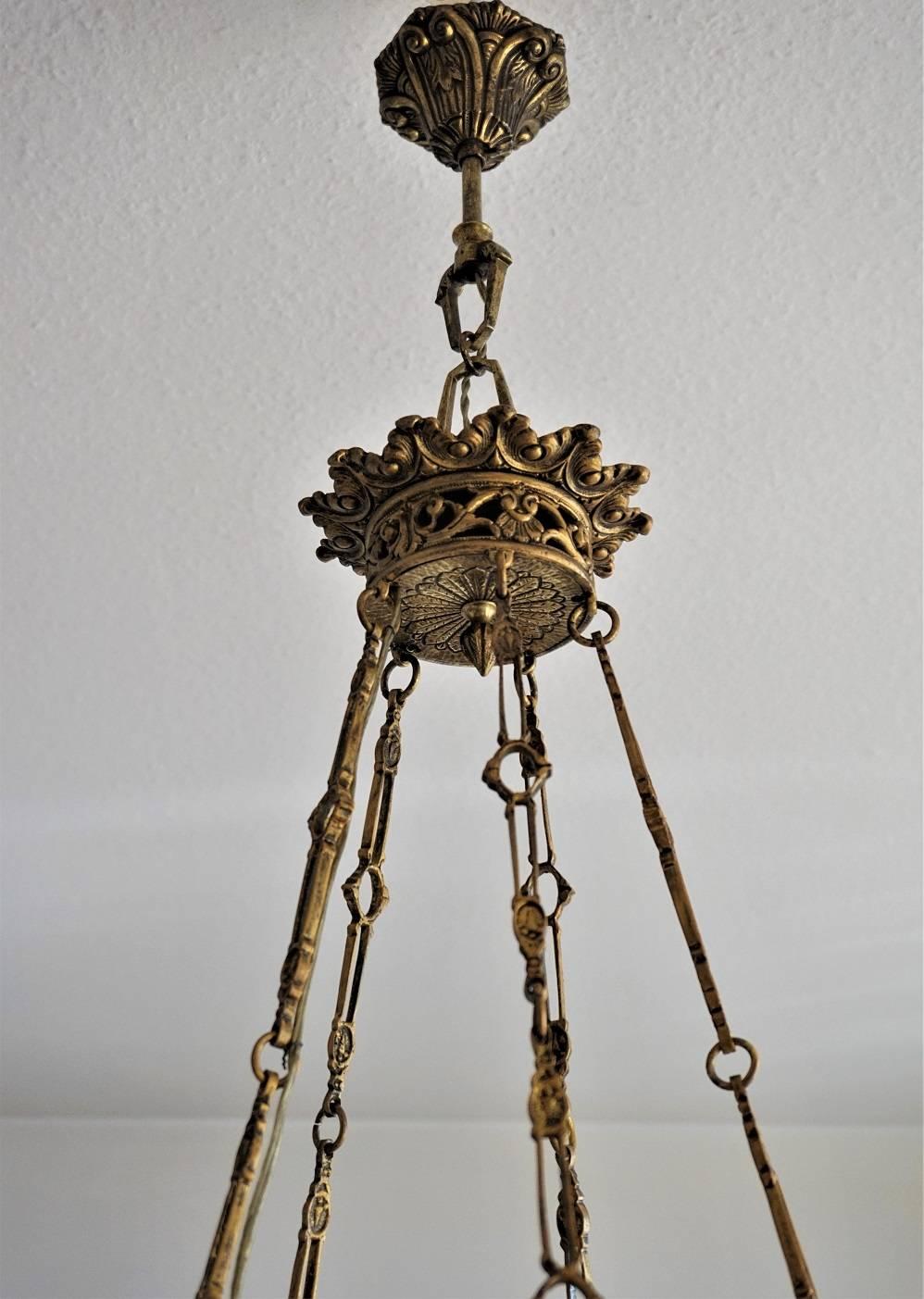 Early 20th Century French Art Deco Bronze Frosted Glass Seven-Light Chandelier (Mattiert)