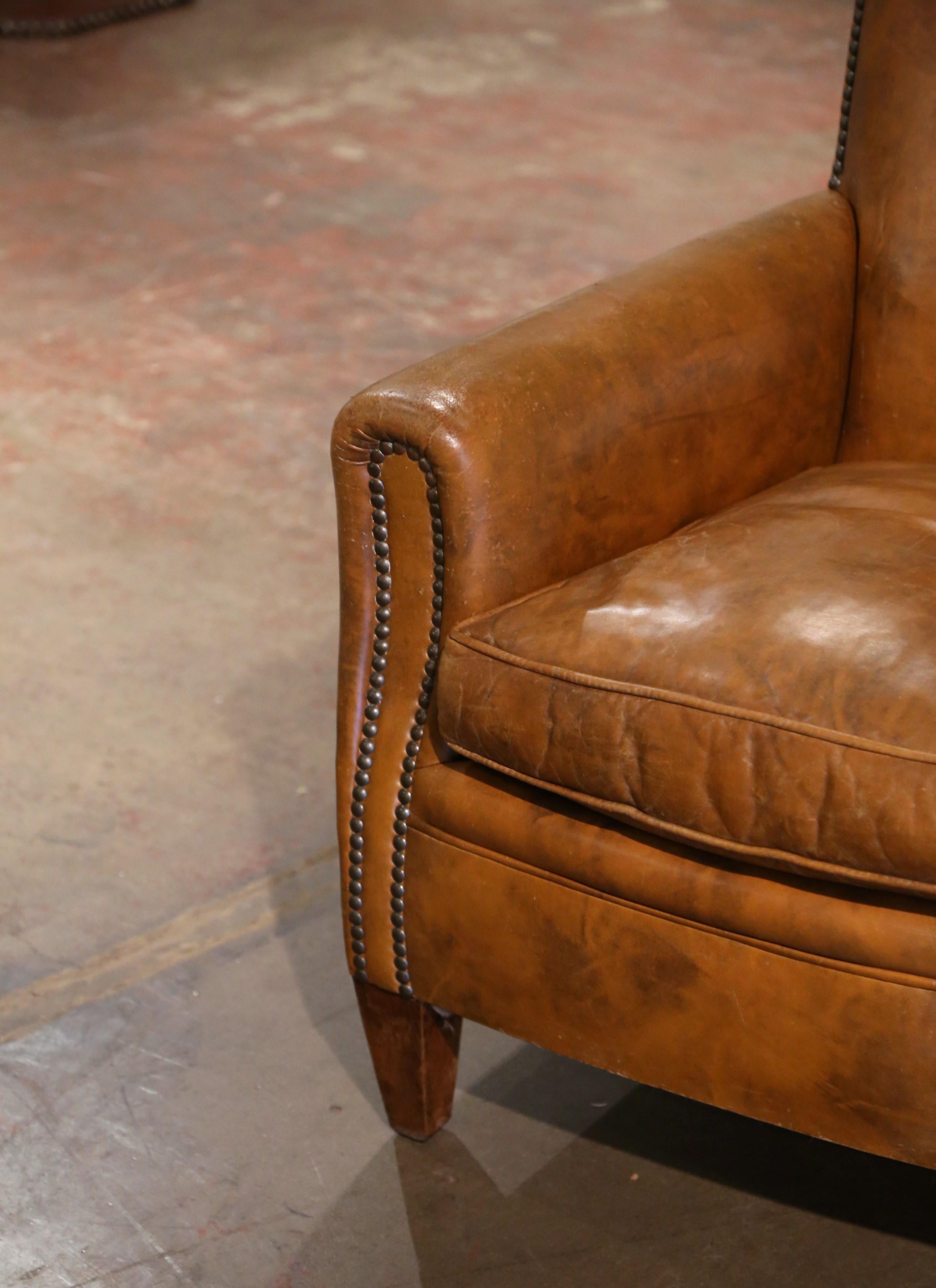 Patinated Early 20th Century French Art Deco Club Armchair with Original Brown Leather For Sale