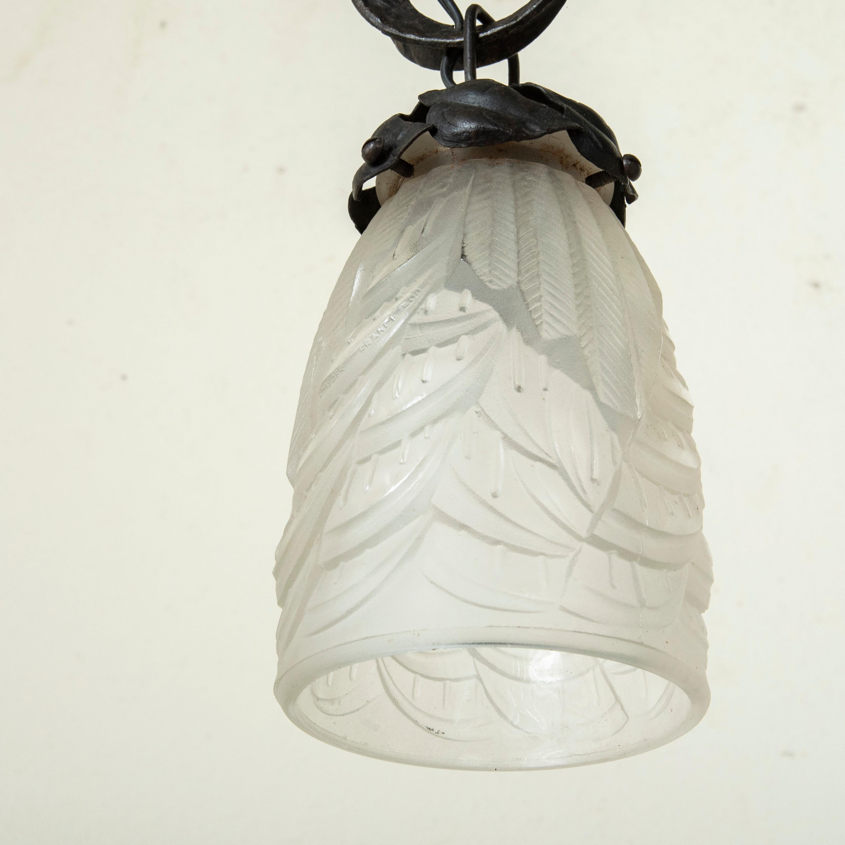 Early 20th Century French Art Deco Period Iron and Glass Chandelier, Four Lights For Sale 8