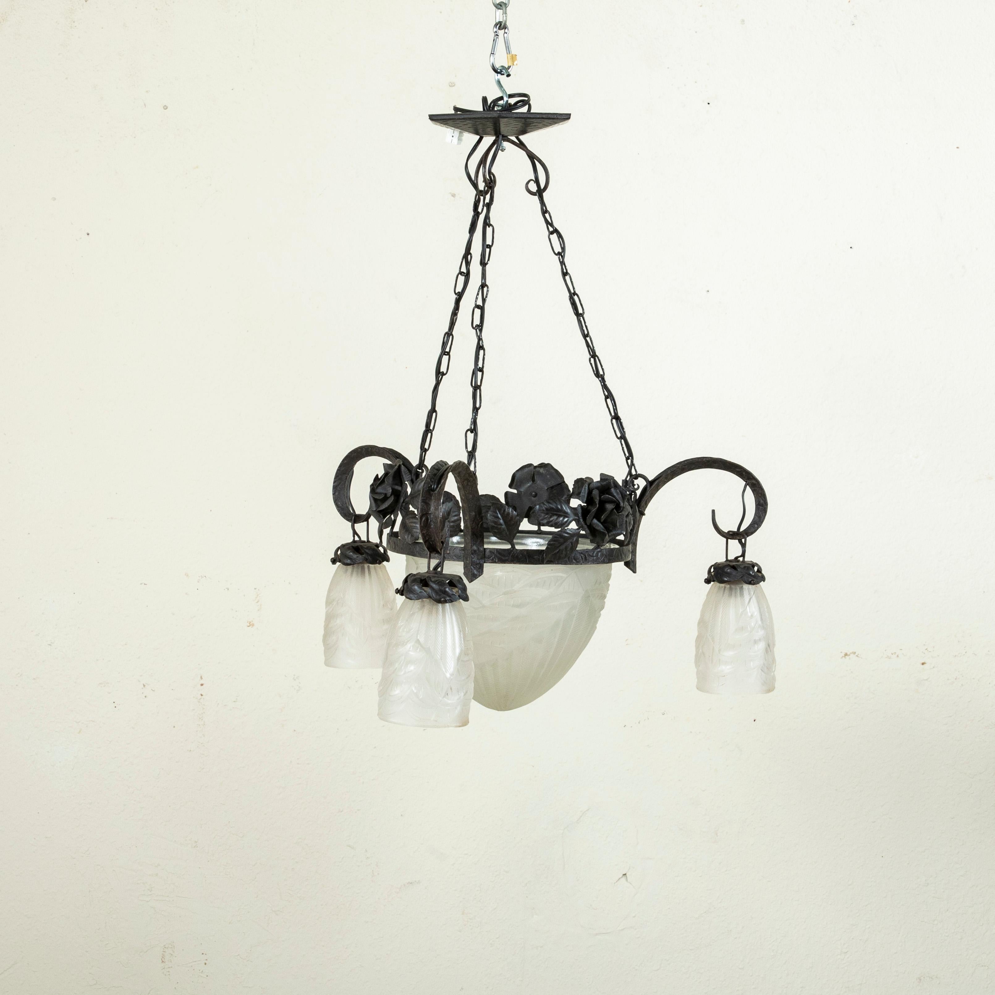 Early 20th Century French Art Deco Period Iron and Glass Chandelier, Four Lights In Good Condition For Sale In Fayetteville, AR
