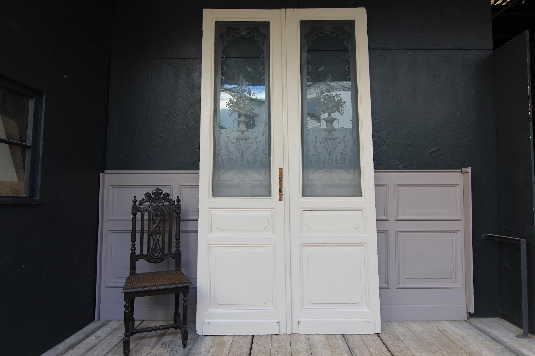 French Art Nouveau double door with etched glass from circa 1910.
Made of solid pine wood and painted in white.

The double door is in unrestored condition (please see the pictures).

Dimensions: 
273 cm high / 107.48 inch high,
145 cm wide /