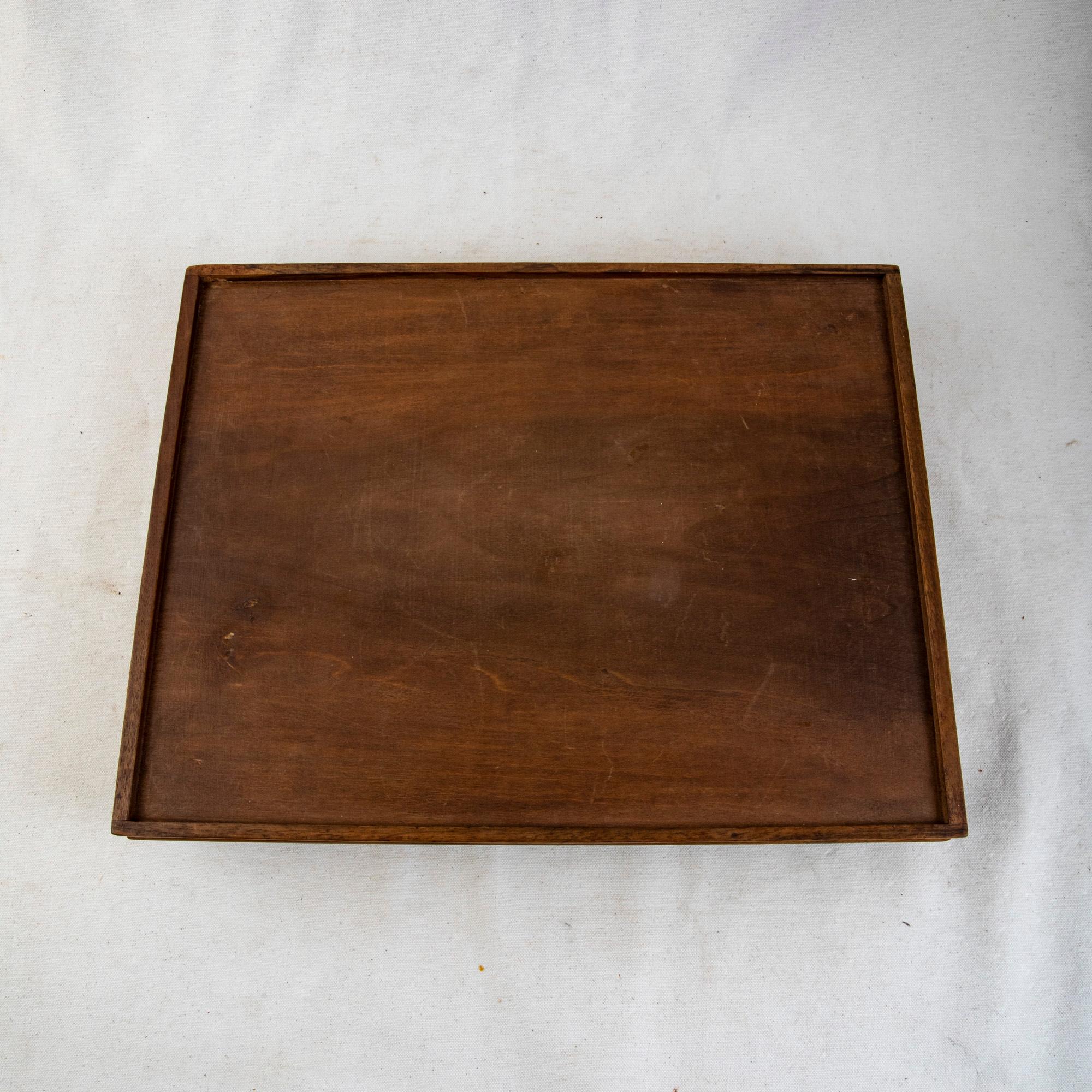 This French Art Nouveau period palisander tray is signed by the renowned artist Galle (Emile Galle 1846-1904). This tray features inlaid lily of the valley in sycamore and lemonwood. Cut out handles on both sides allow for easy carrying. The tray
