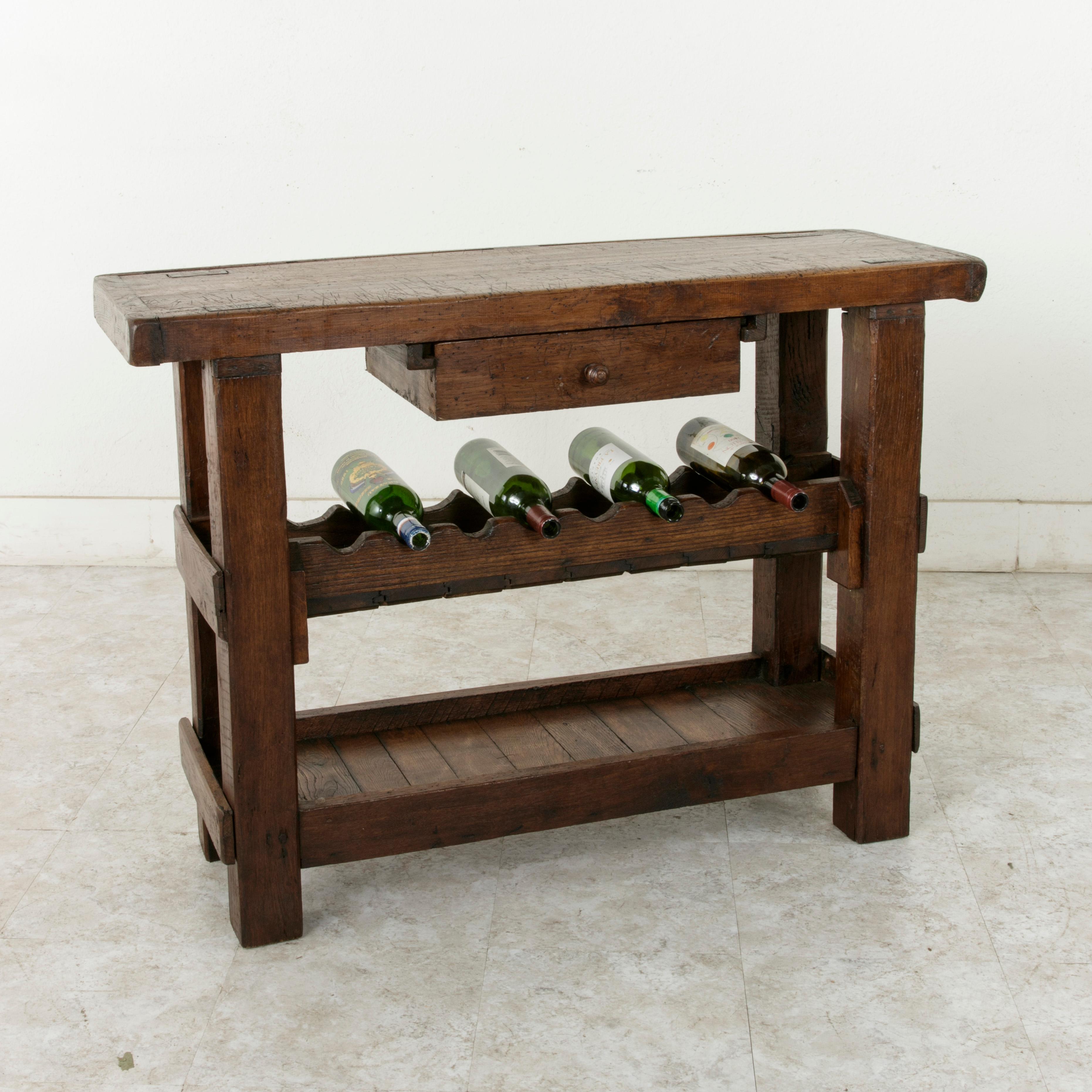 Rustic Early 20th Century French Artisan Made Oak Workbench Console with Wine Rack