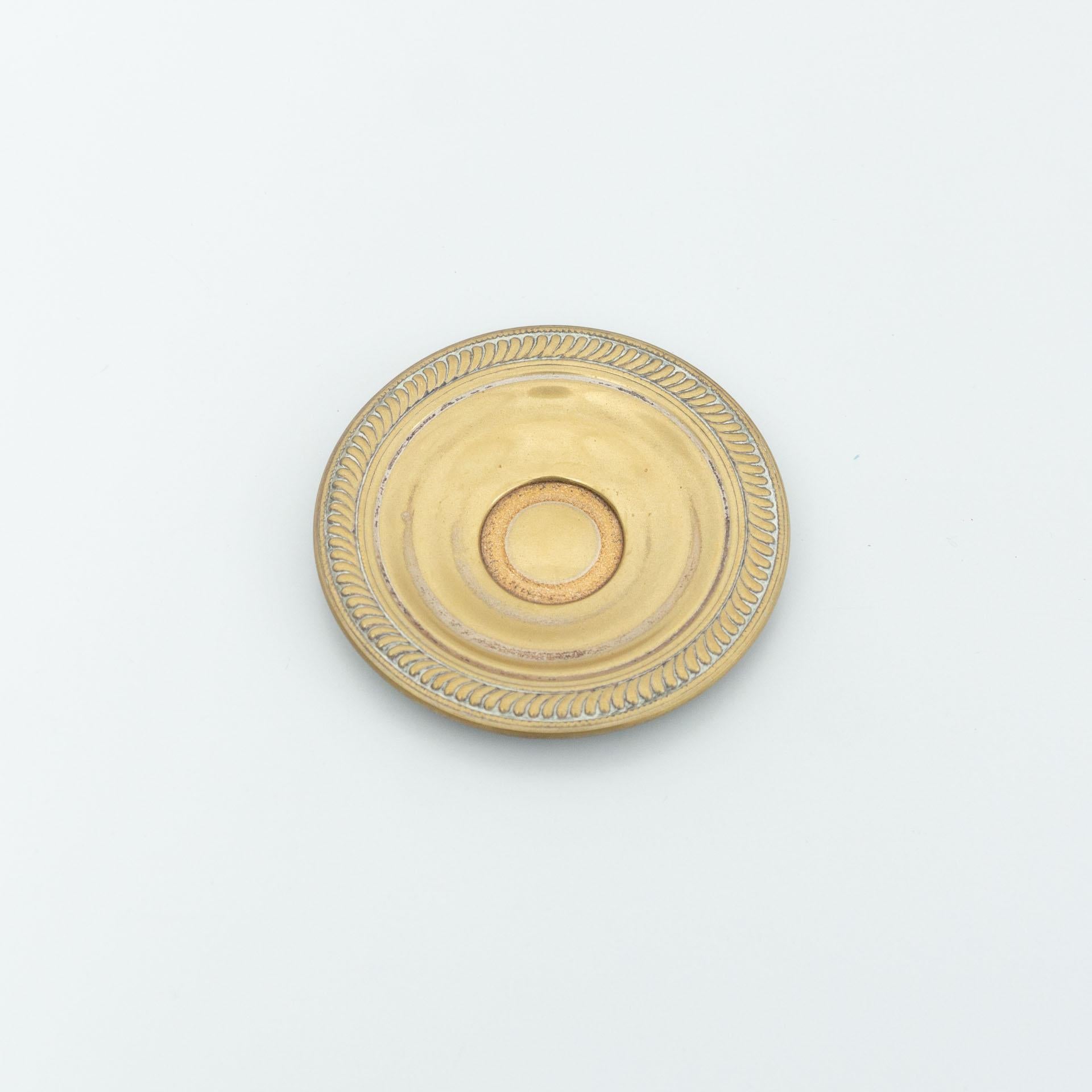 Metal ashtray by unknown manufactured from France, circa early 20th century.

In original condition, with minor wear consistent with age and use, preserving a beautiful patina.

Material:
Metal

Dimensions:
Ø 11.4 cm x H 1 cm.