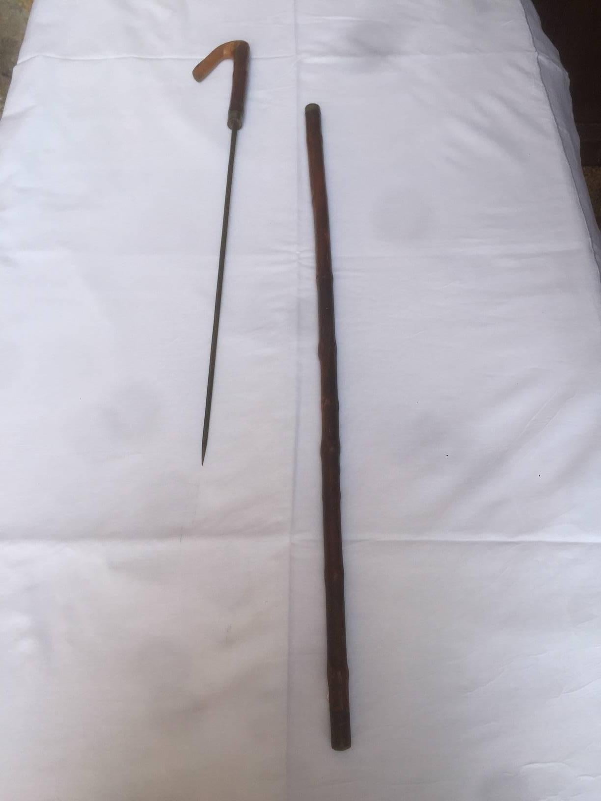 Very nice French bamboo Dagger Cane. The dagger is hiding by the lower part of the cane.