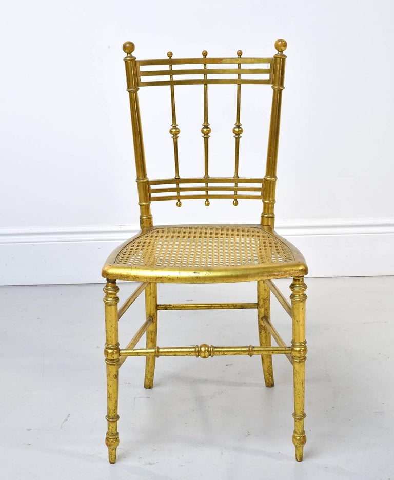 Chaise Belle Époque française du début du XXe siècle en bois doré avec  assise en canne. En vente sur 1stDibs