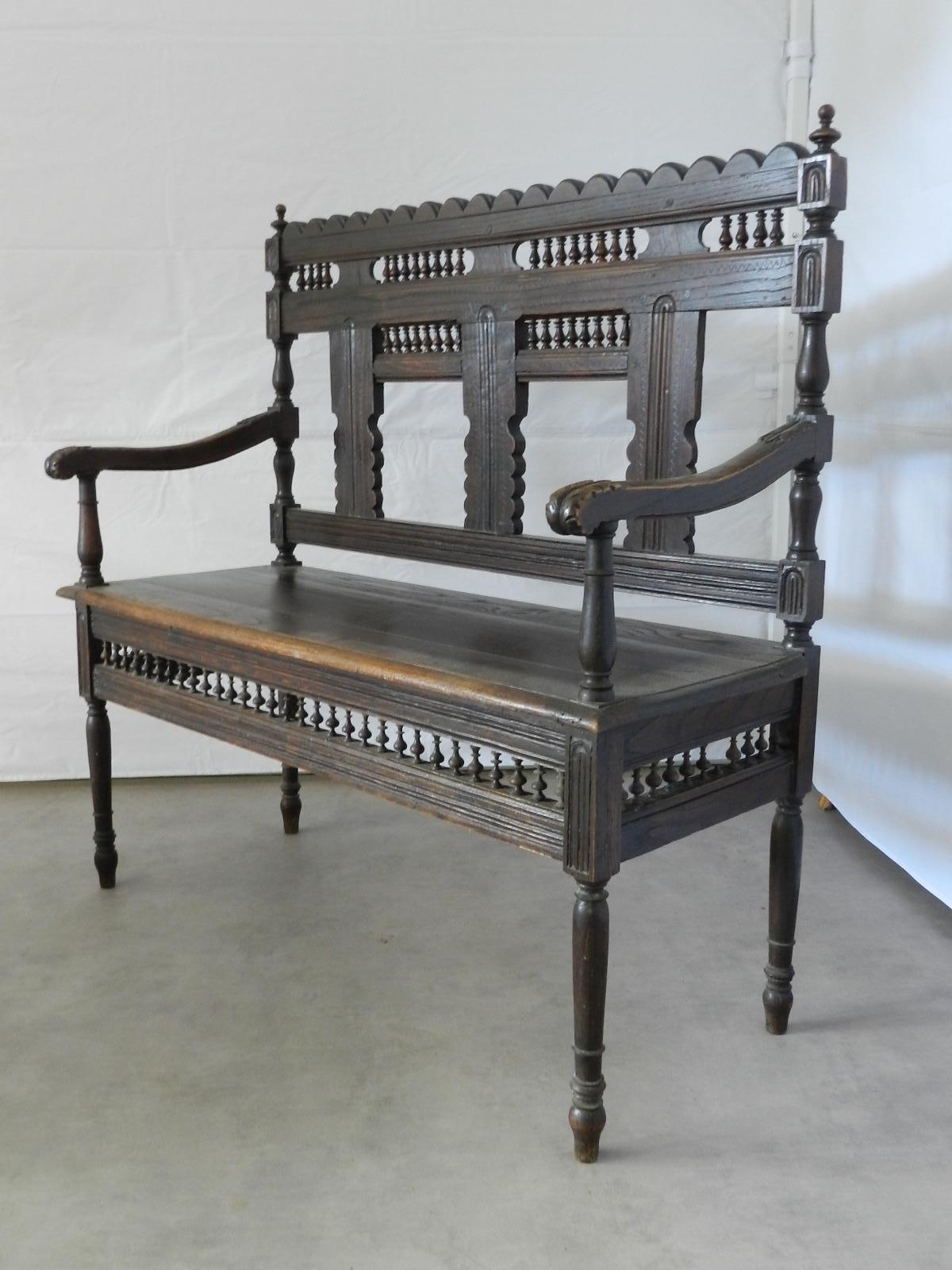 French hall bench, circa 1910
Open arm with inset turnings
Attractive settle would look great in any room
French Provincial carved chestnut
In good vintage condition with minor signs of use for its age, one turning is missing on one side hard to