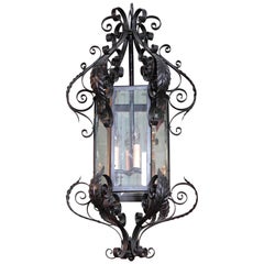 Antique Early 20th Century French Black Iron and Beveled Glass Four-Light Lantern