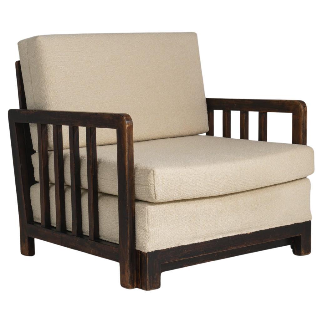 Fauteuil en bouclette français du début du 20e siècle, patine d
origine en vente