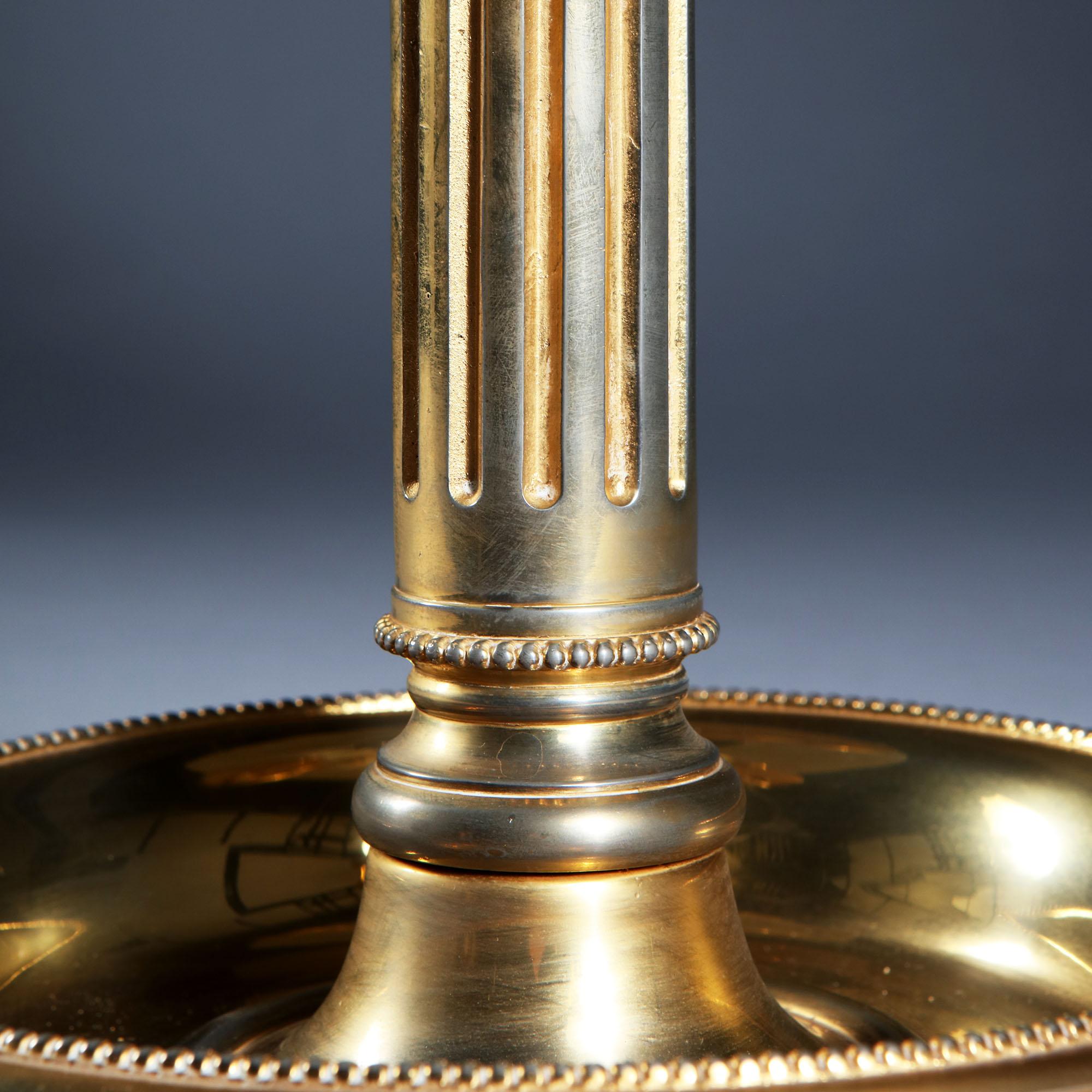 An exceptional early 20th century Bouillotte lamp of large scale, with finely gilded bronze mounts and painted tole shade.