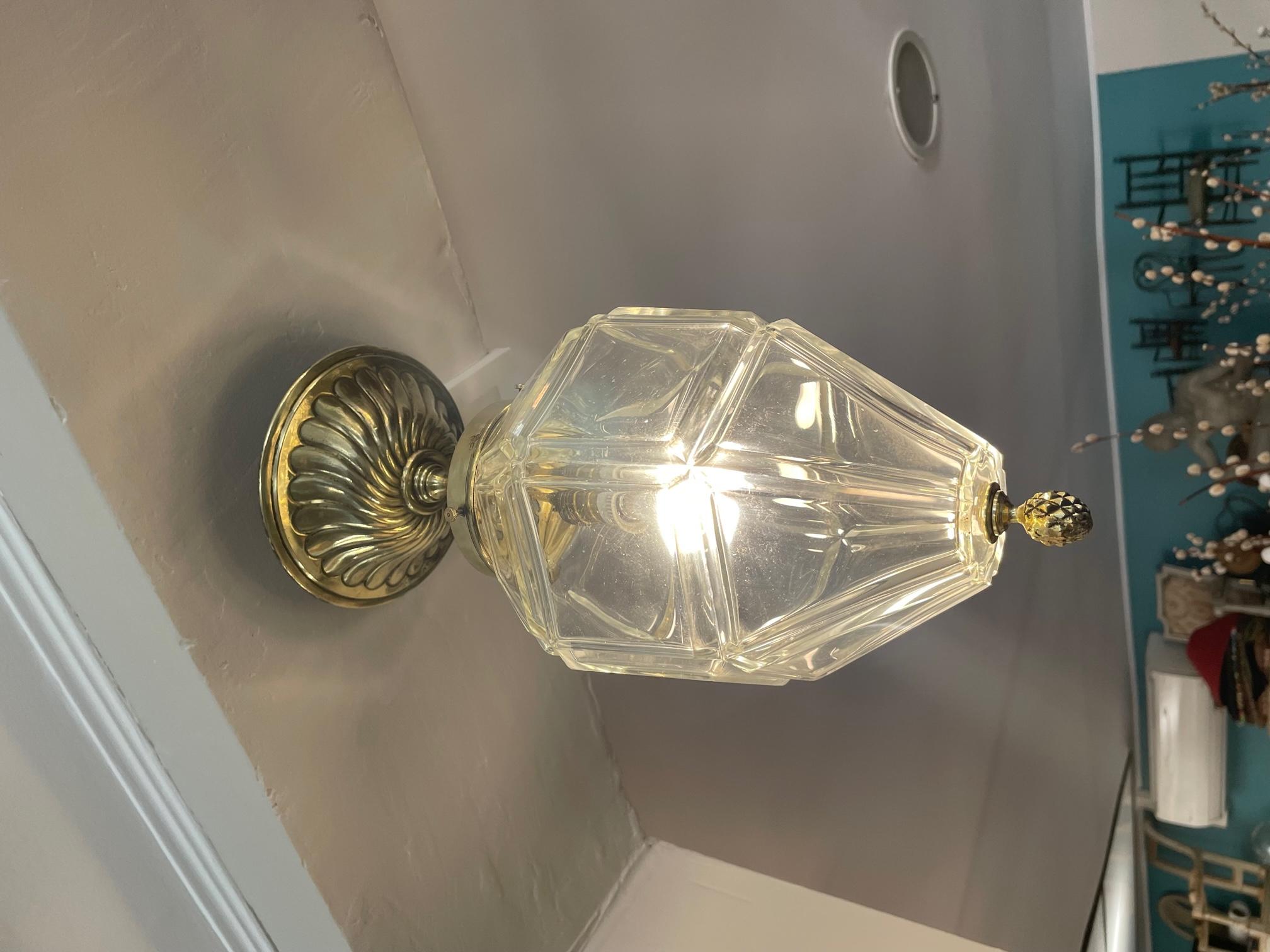 Very nice early 20th century French gilded brass and beveled glass light pendant. 
A glans is decorating the bottom of the pendant. 
Very nice quality and condition.