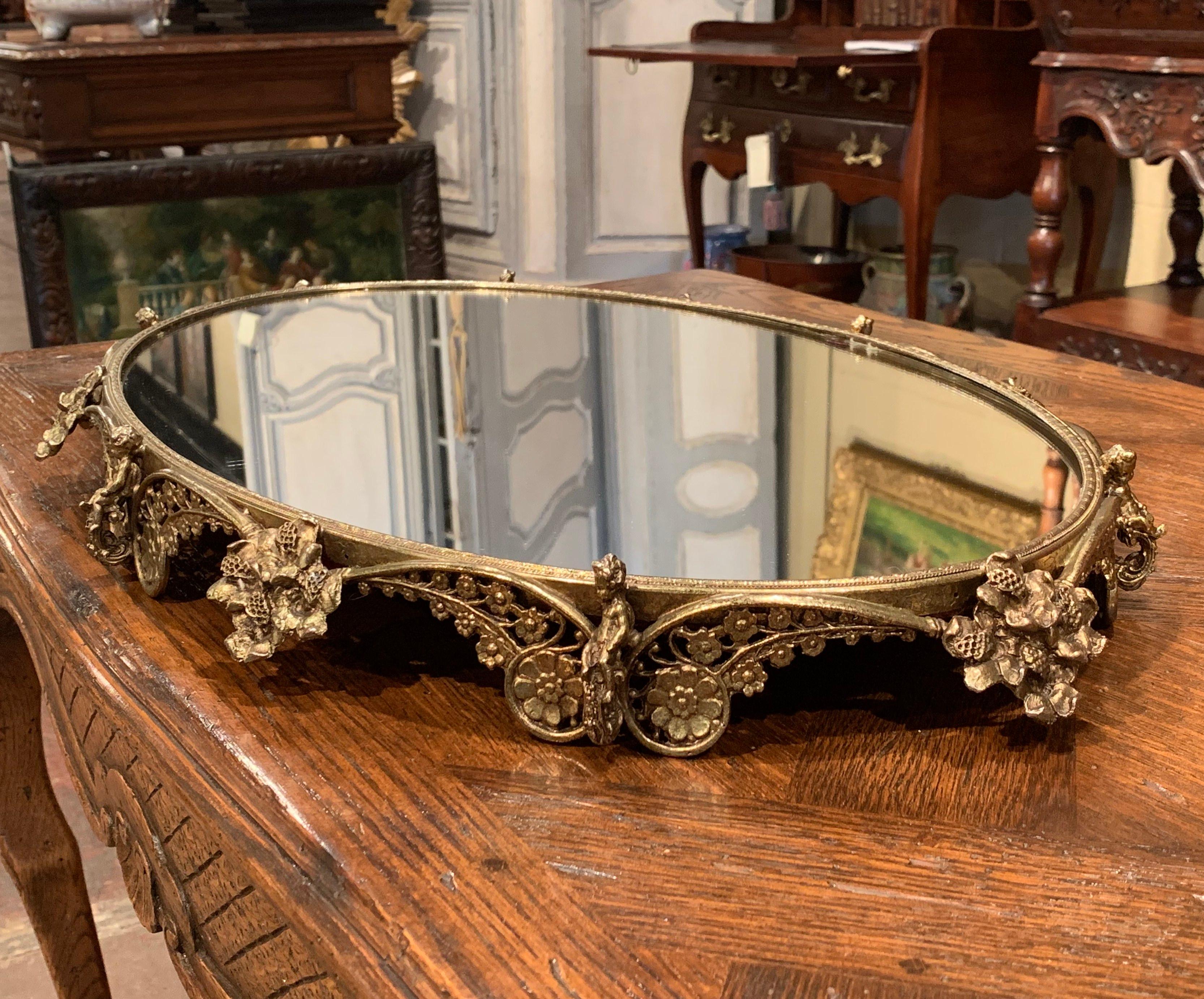 Early 20th Century French Brass Mirrored Plateau with Floral and Cherub Decor In Excellent Condition In Dallas, TX