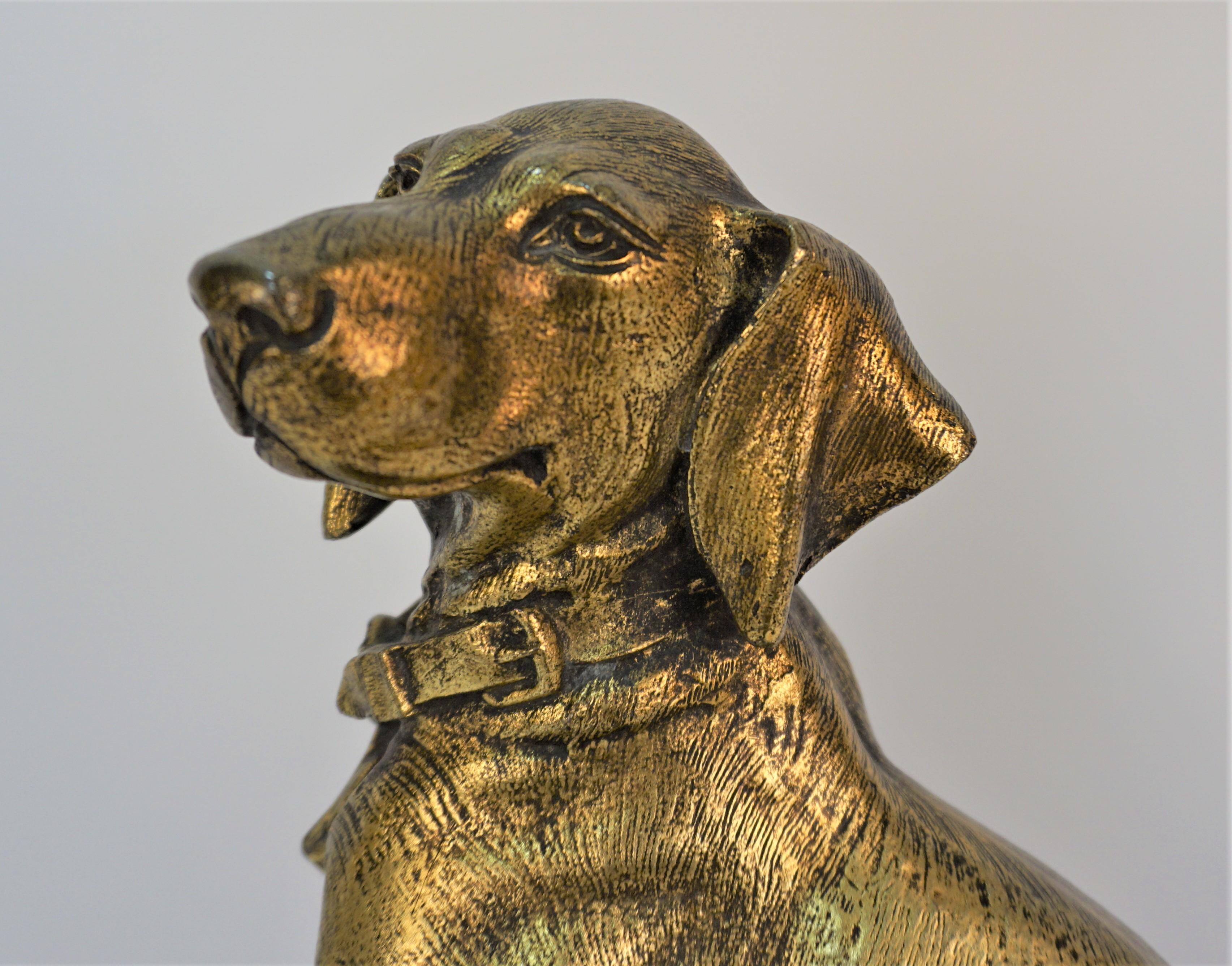 Early 20th Century French glided bronze dog sculpture on marble base setting at edge 