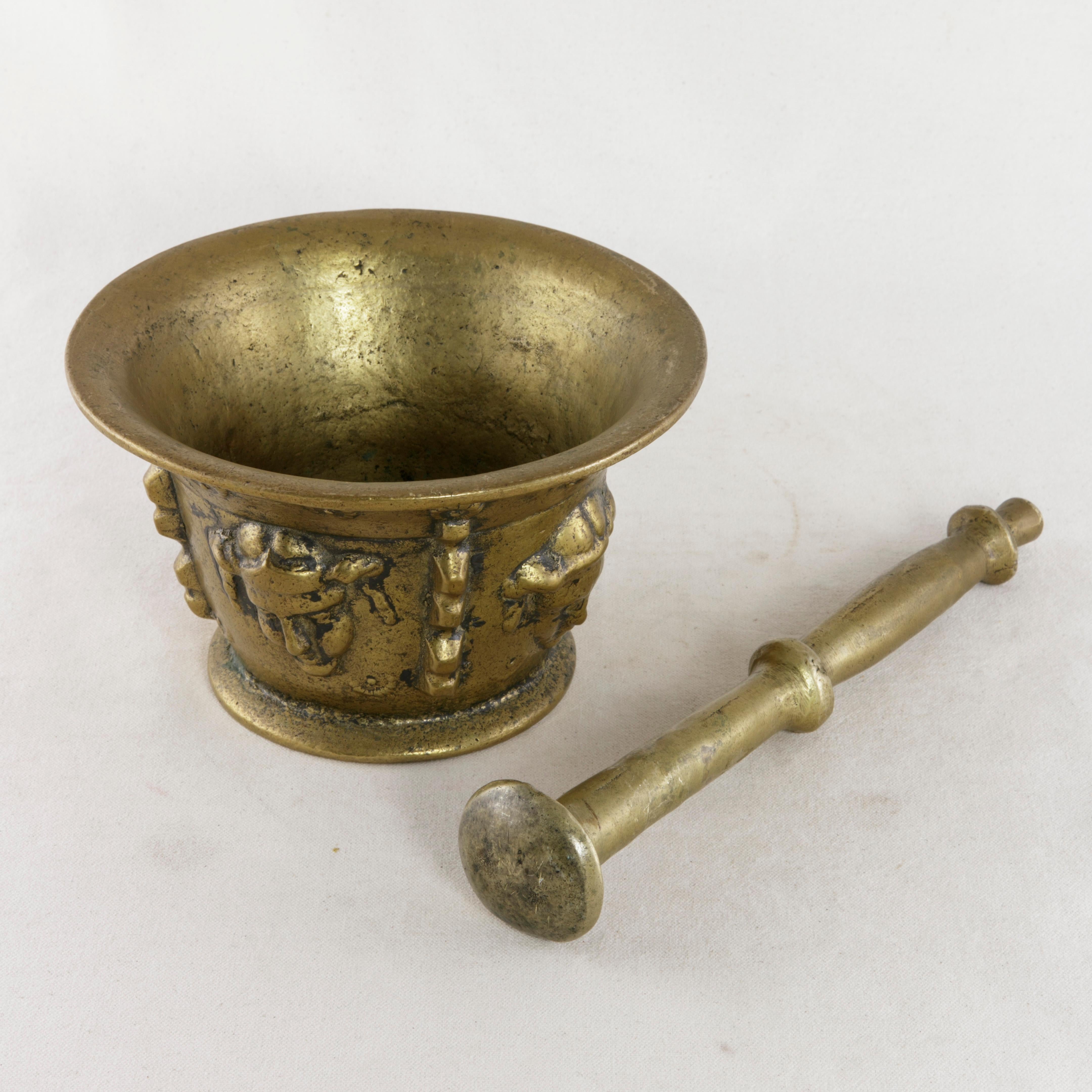 Early 20th Century French Bronze Mortar and Pestle with Masks Motif 7