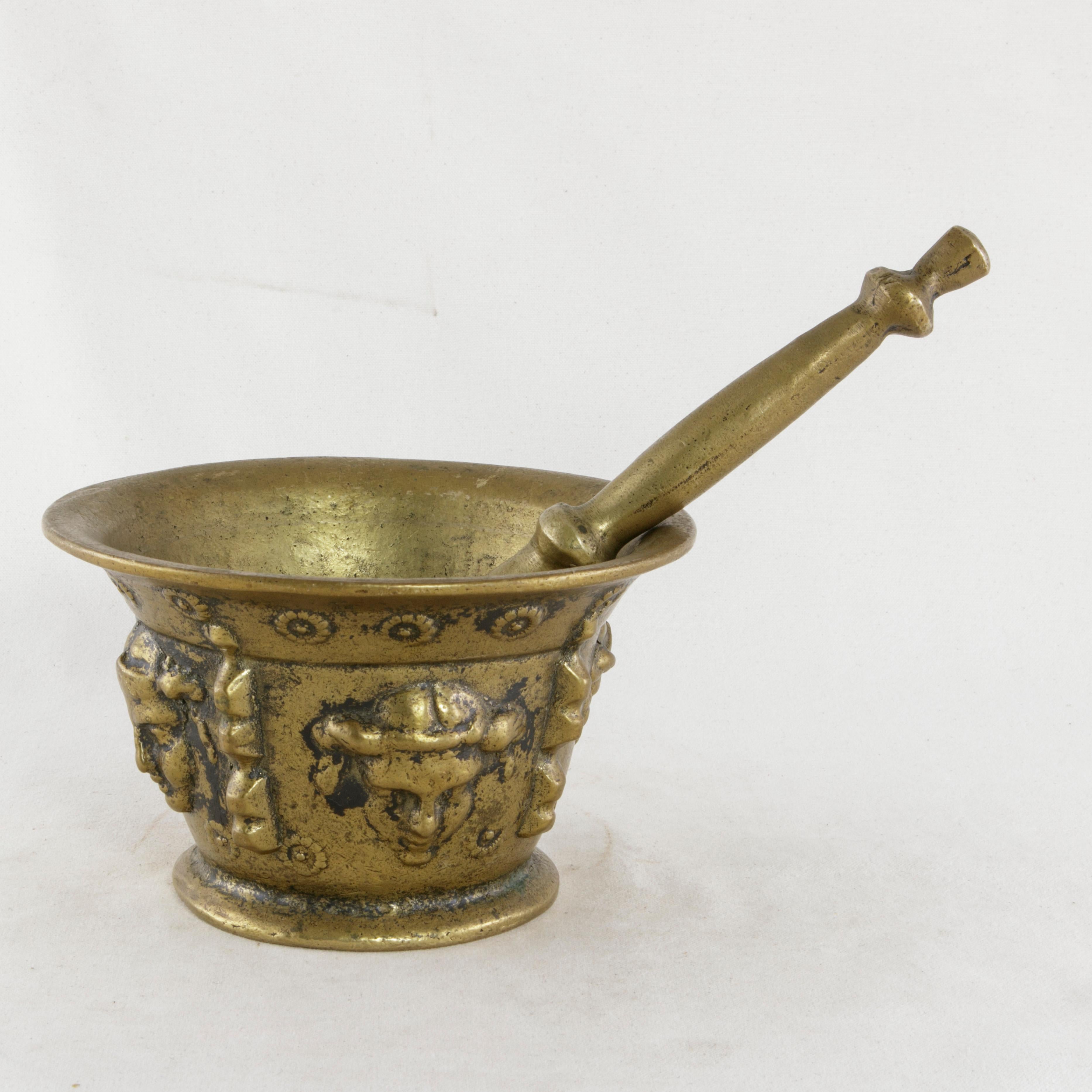 Early 20th Century French Bronze Mortar and Pestle with Masks Motif In Good Condition In Fayetteville, AR