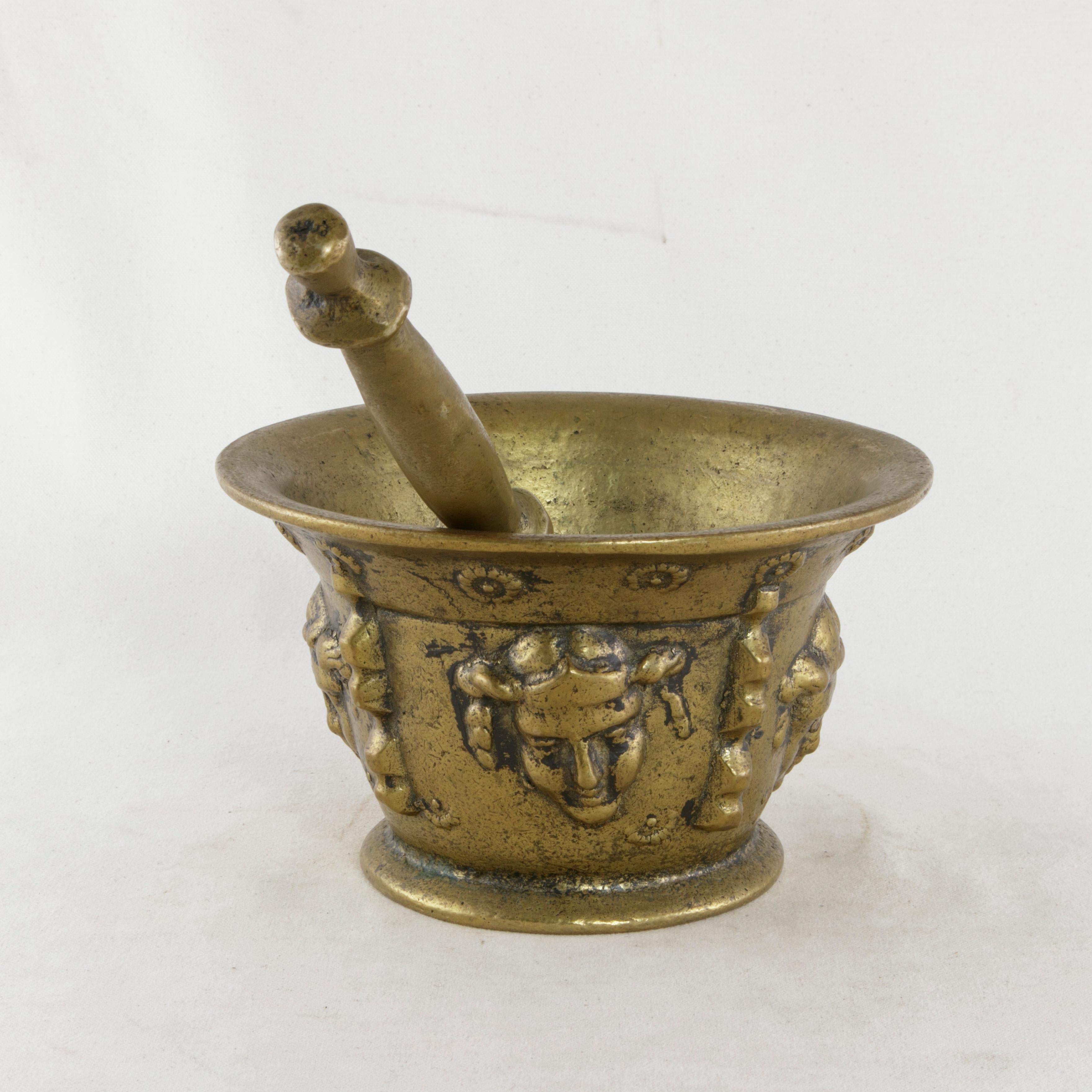 Early 20th Century French Bronze Mortar and Pestle with Masks Motif 1